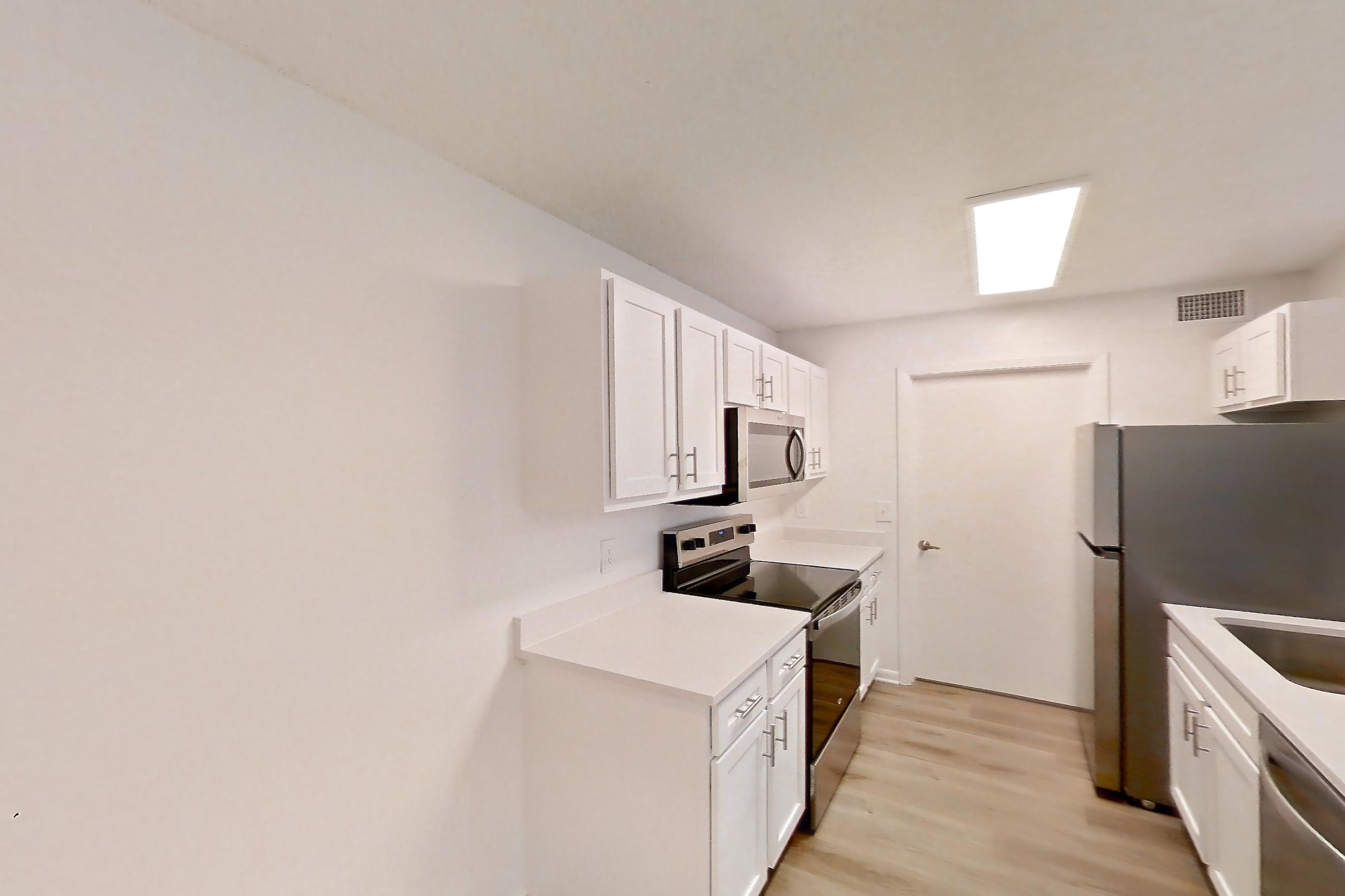 Living space in Apartment 1312 at Turtle Cove, 1B floor plan