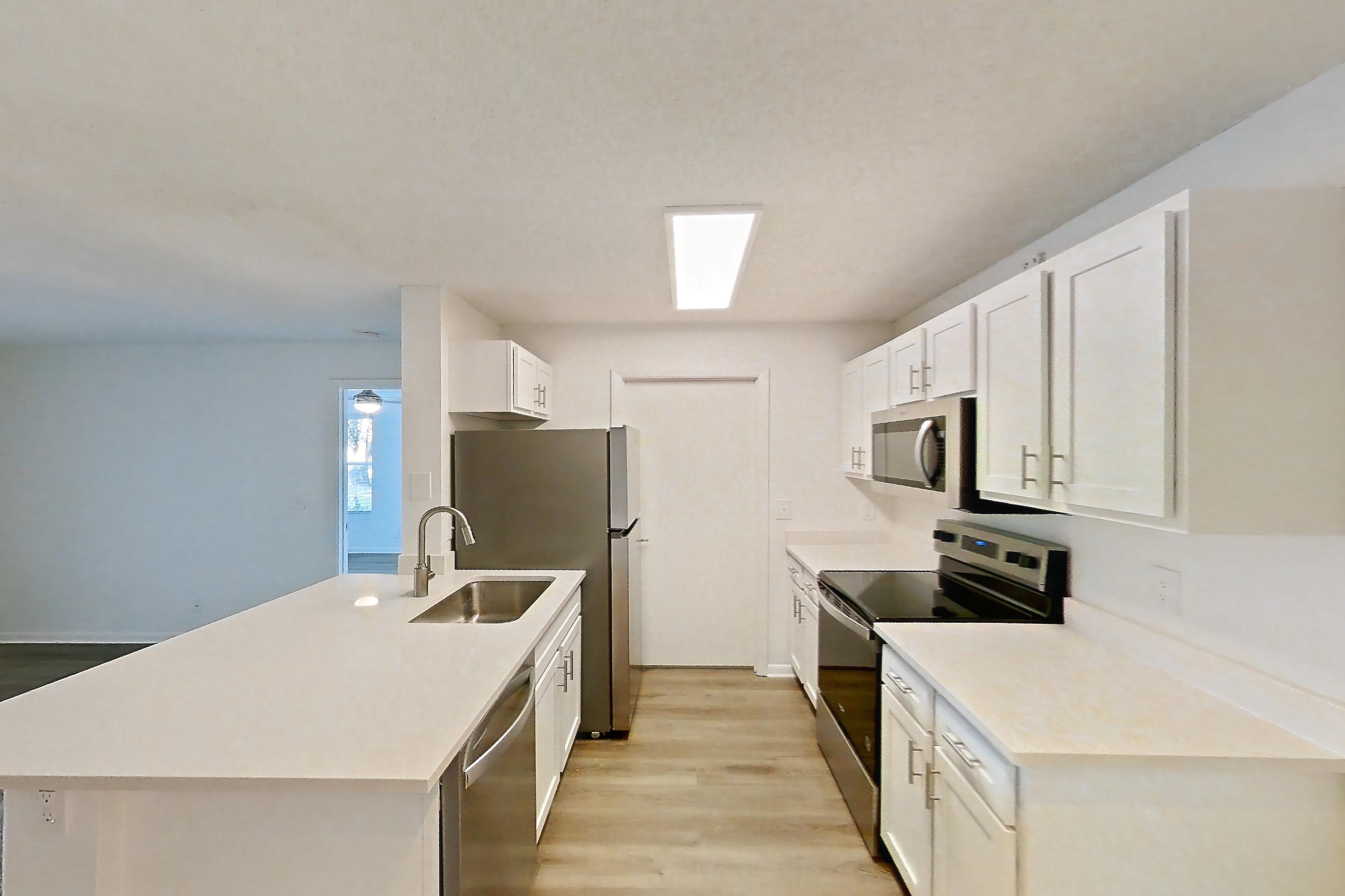Living space in Apartment 0701 at Turtle Cove, 2B floor plan