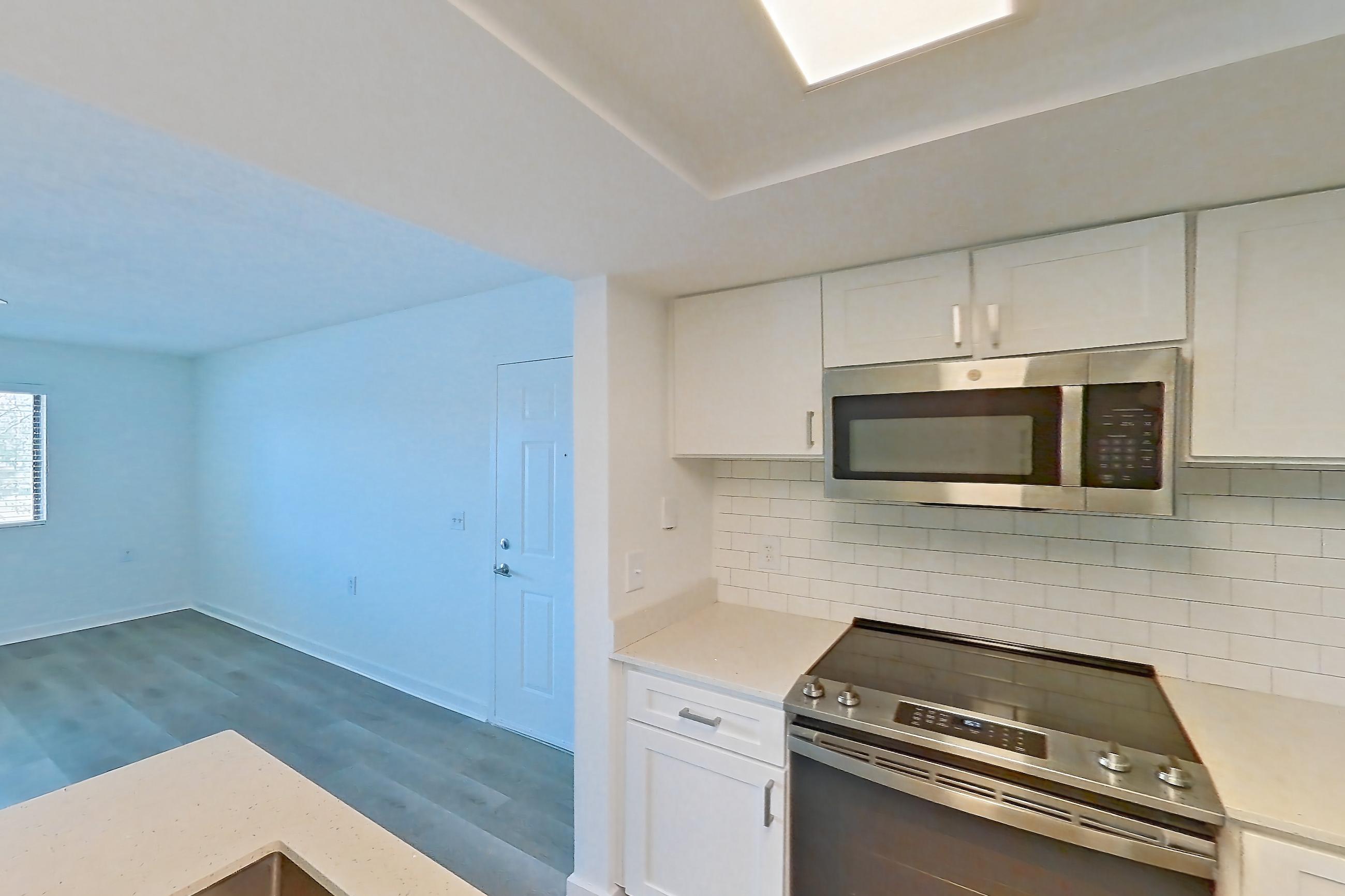 Kitchen in Apartment 01-027 at The Reserve at Ashley Lake, 1A floor plan