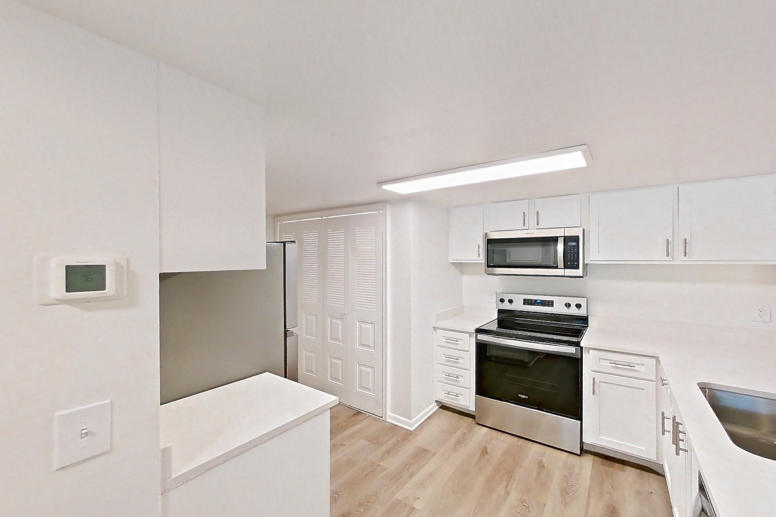 Kitchen entryway in Apartment 02-024 at The Reserve at Ashley Lake, 2A floor plan