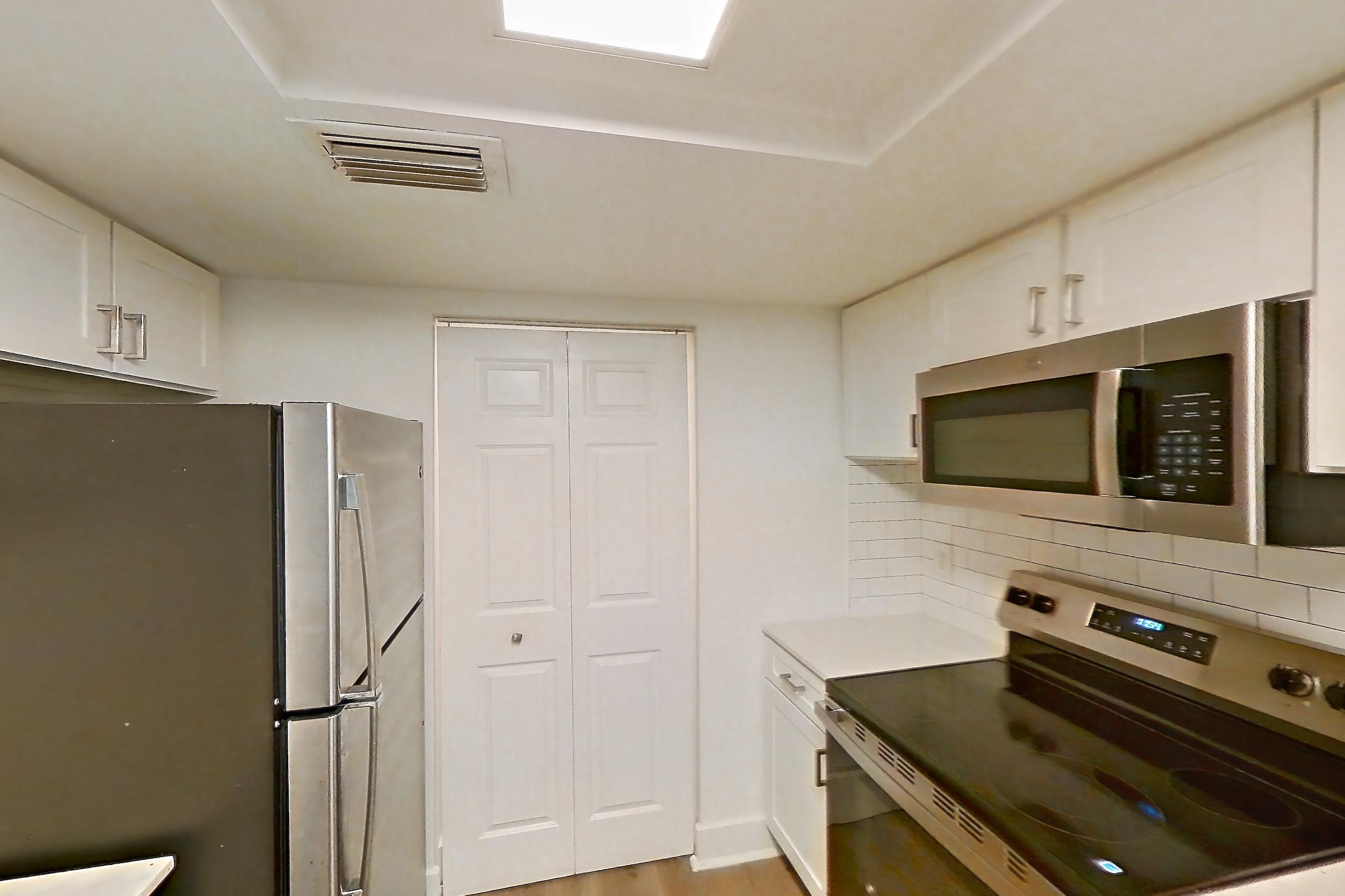Kitchen in Apartment 15-033 at The Reserve at Ashley Lake, 3B floor plan