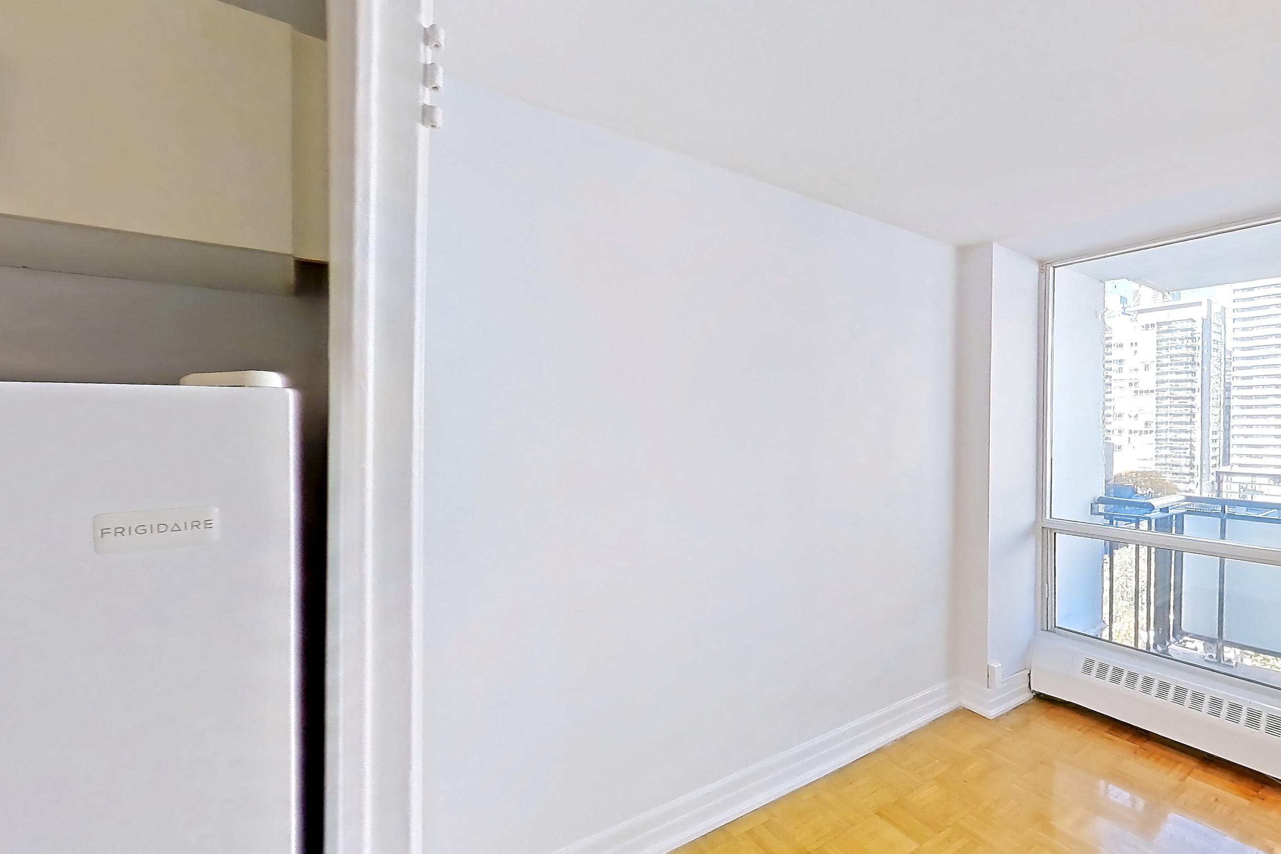 Kitchen in Apartment 1-1204 at Village Green, 2E floor plan