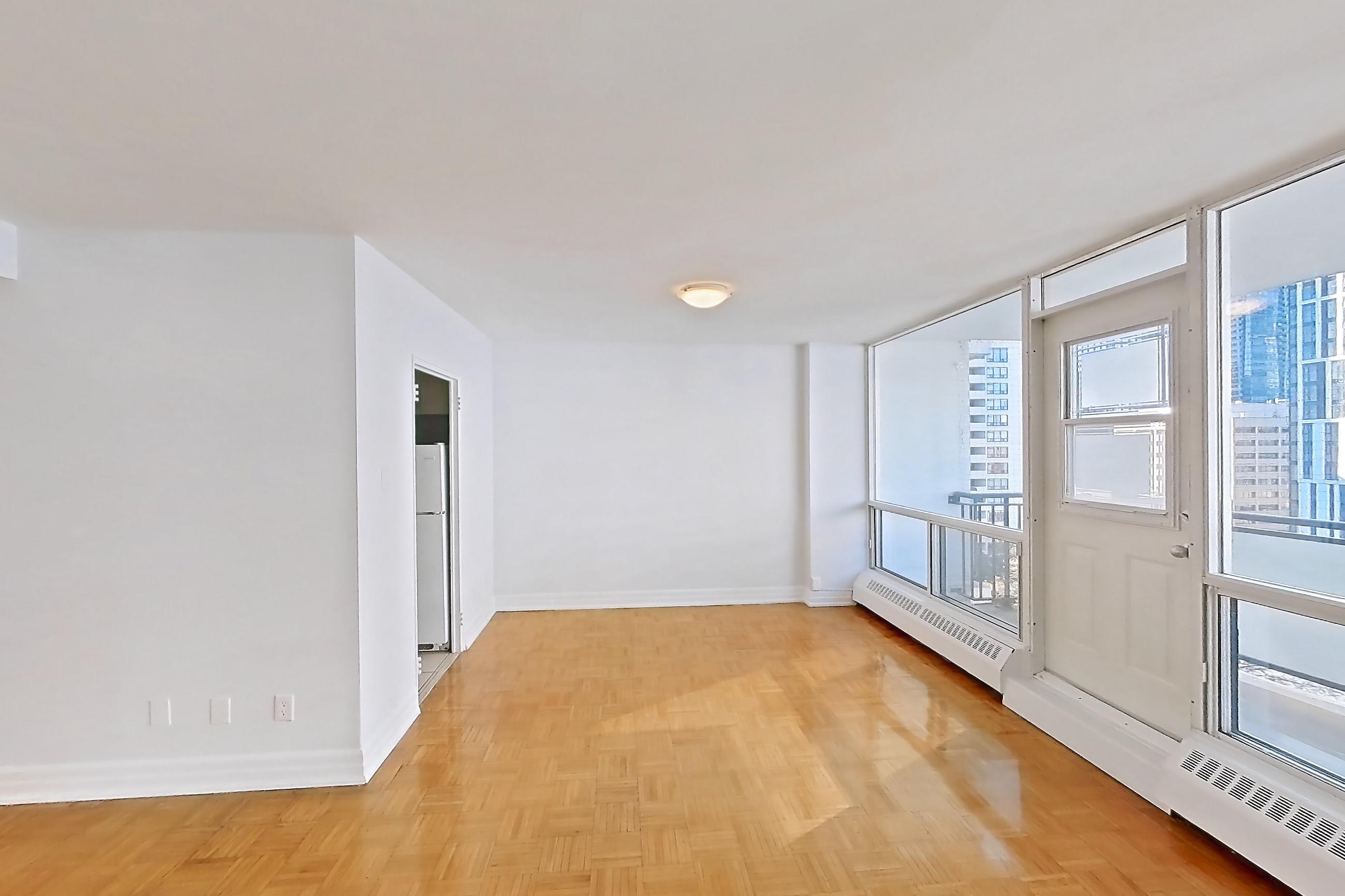 Living room in Apartment 1-1204 at Village Green, 2E floor plan