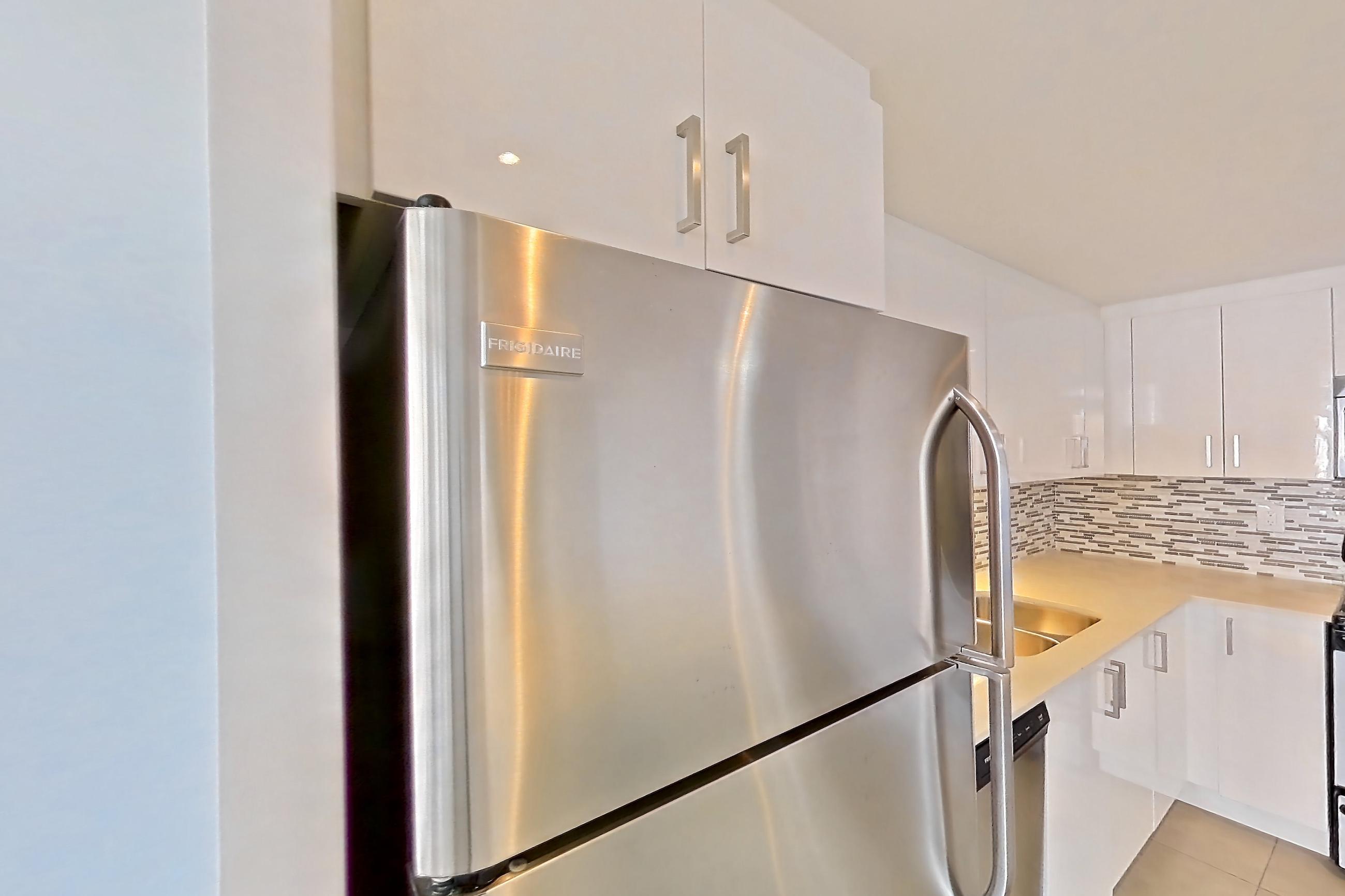 Kitchen in Apartment 1-1611 at Village Green, 2F floor plan