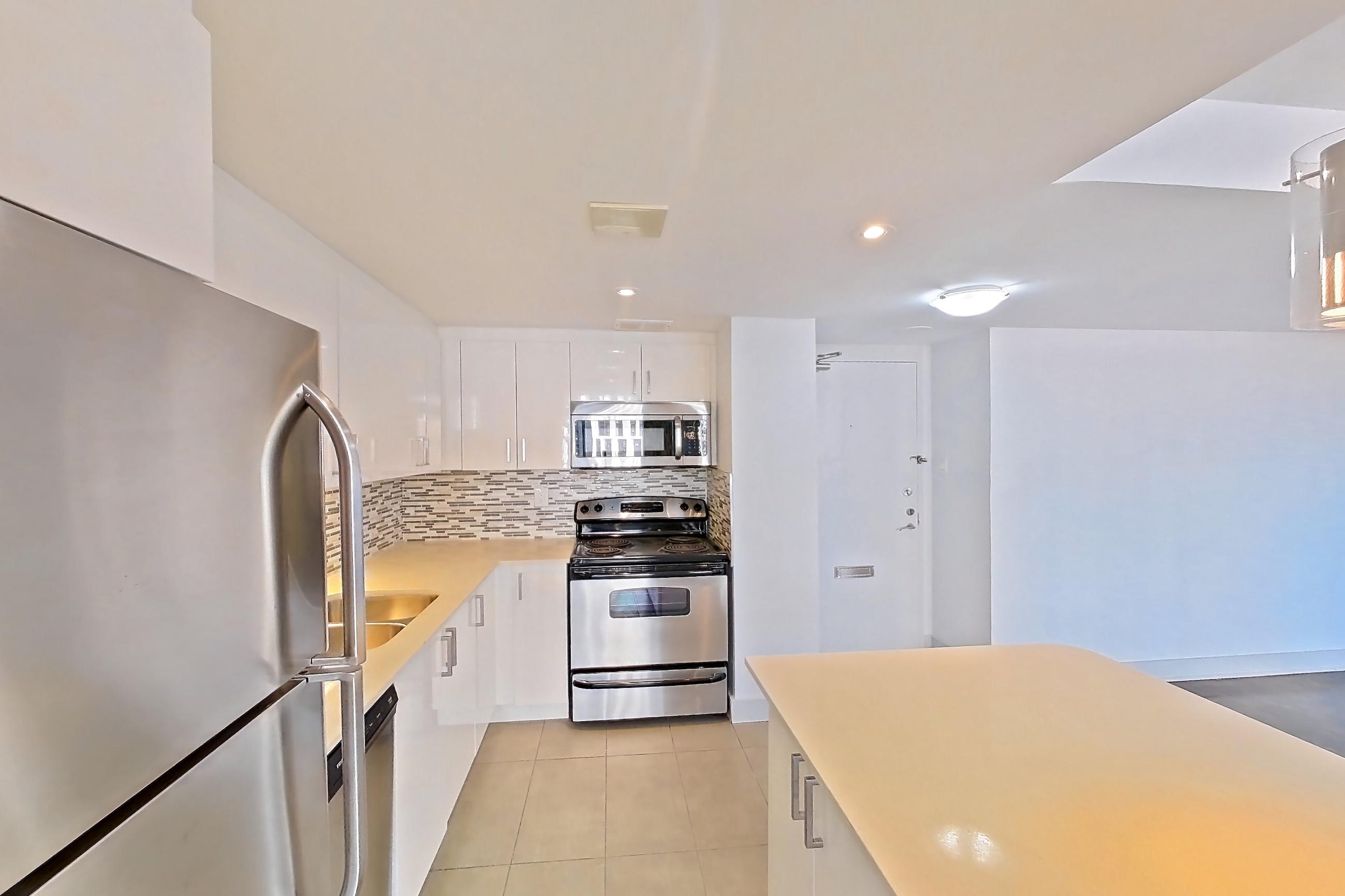 Kitchen in Apartment 1-1611 at Village Green, 2F floor plan