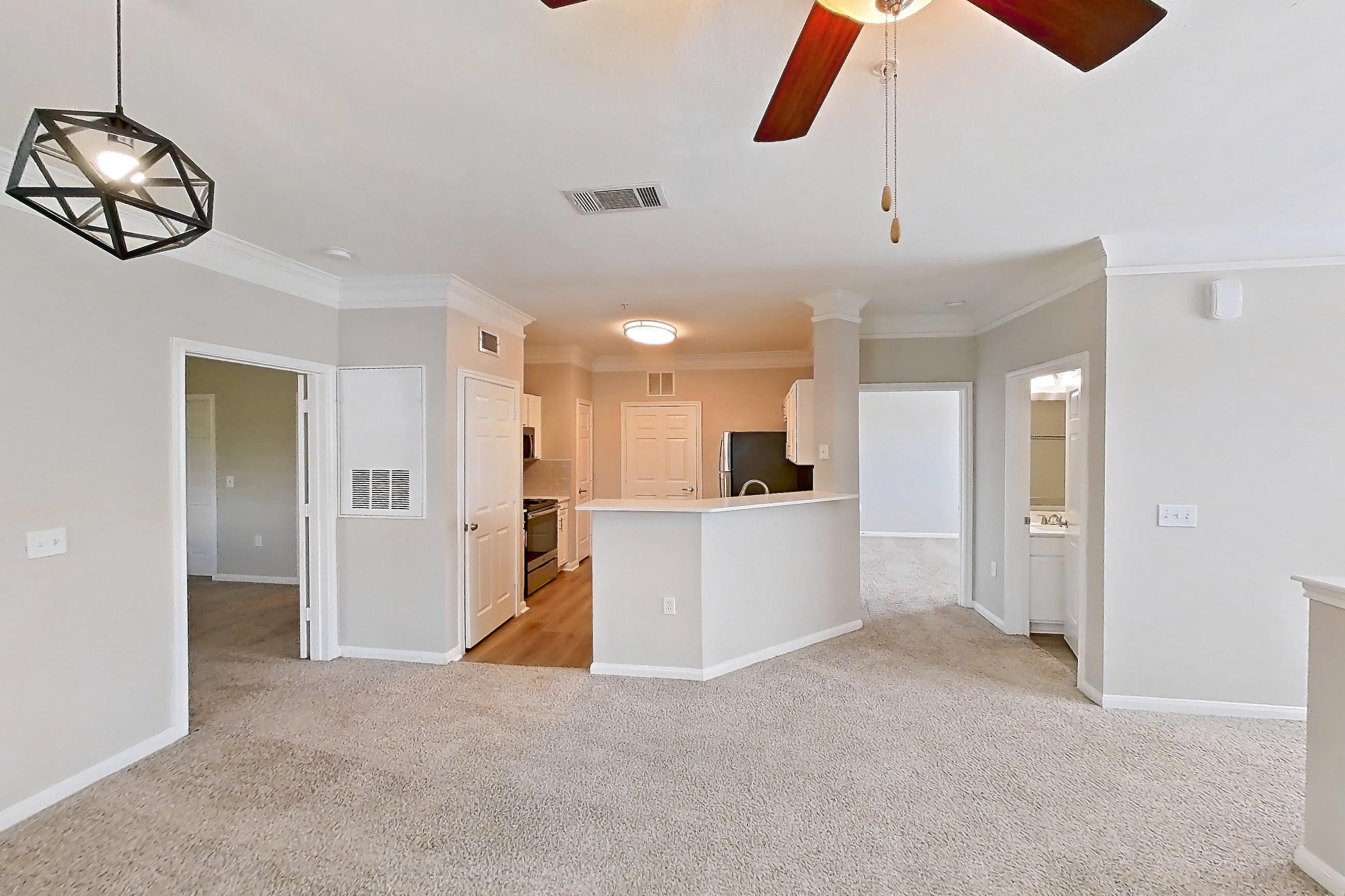 Living room in a 2B floor plan apartment, representative of Apartment 2-19107 at The Villas at Shadow Creek