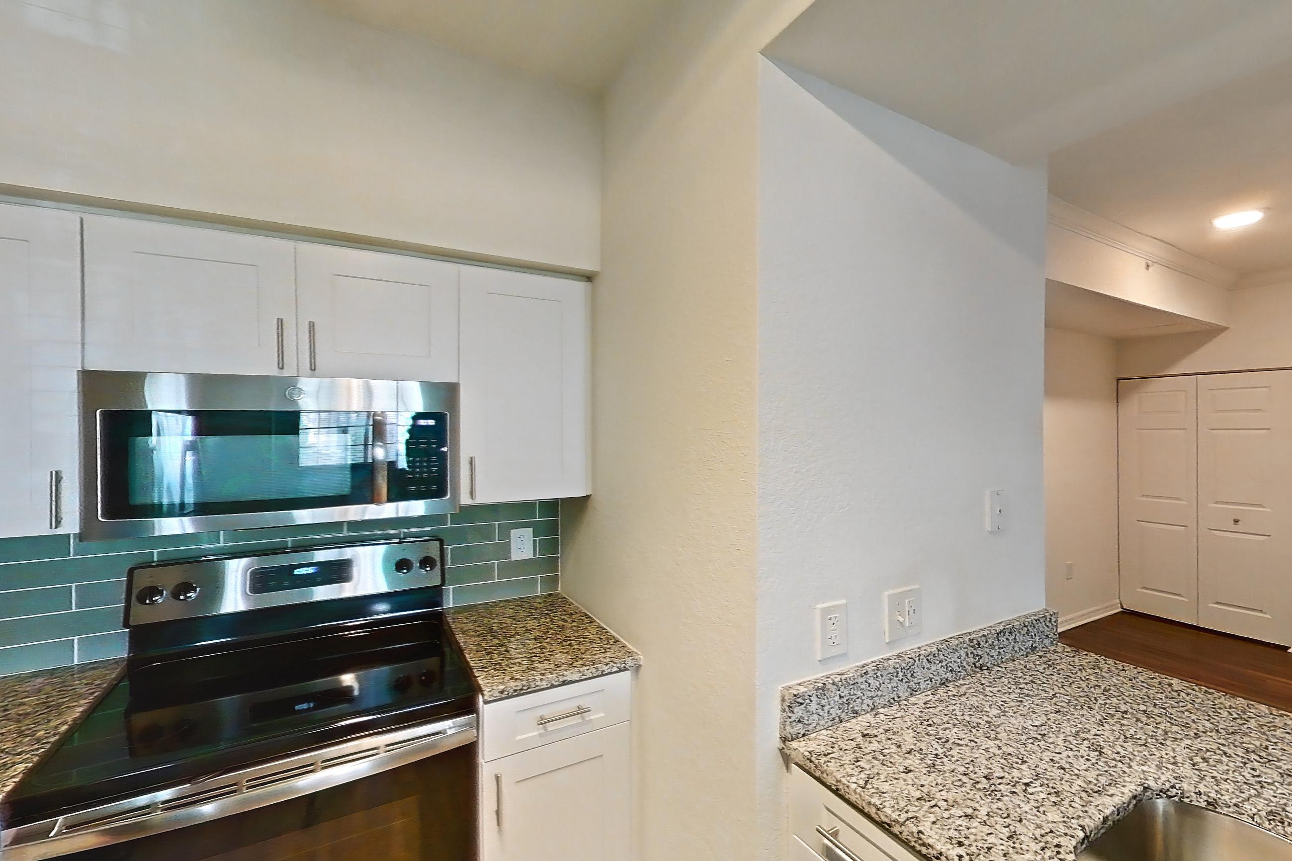 Kitchen in Apartment 01-105 at Solano at Miramar, 1A floor plan