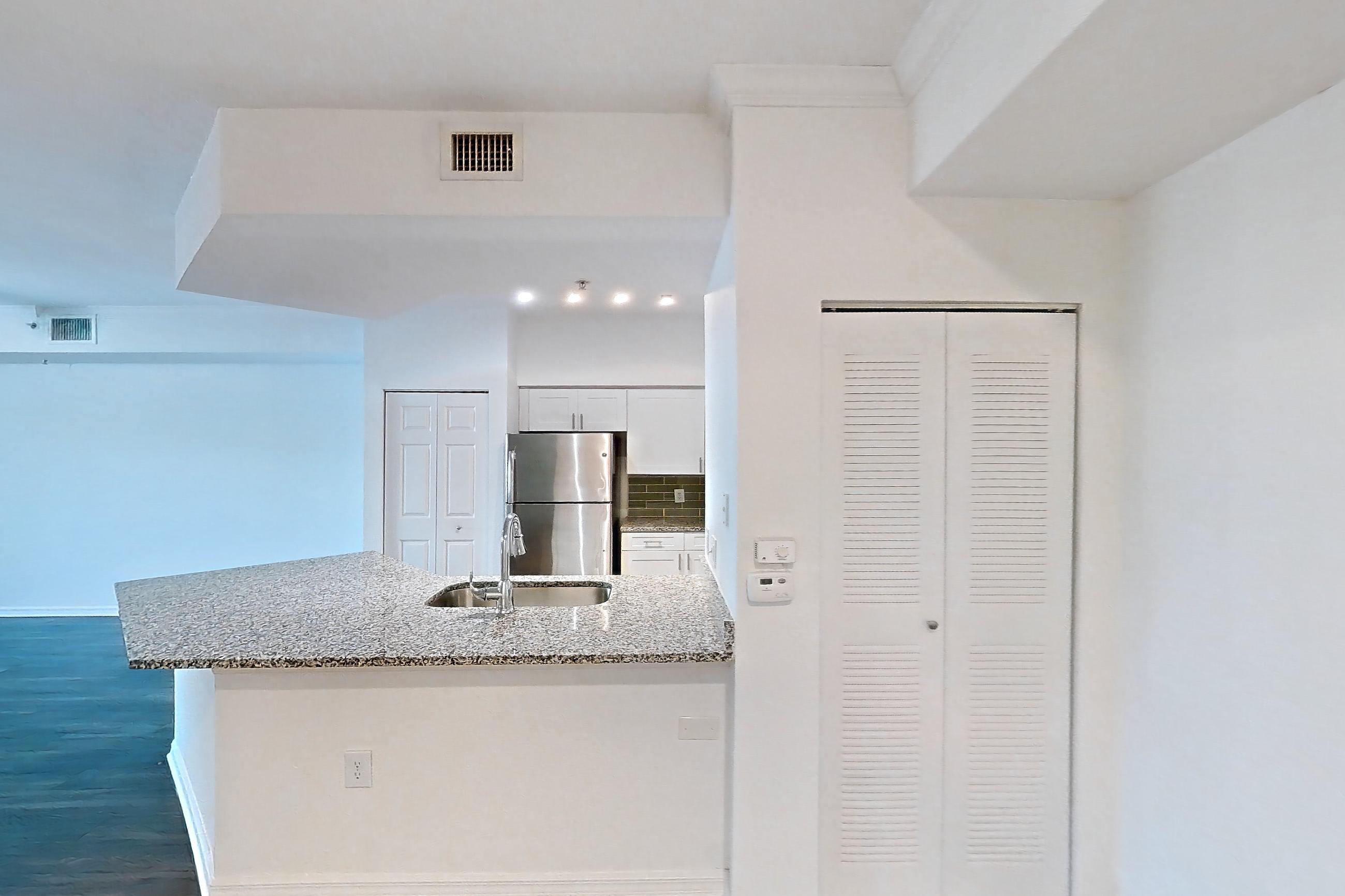 Living space in Apartment 01-105 at Solano at Miramar, 1A floor plan