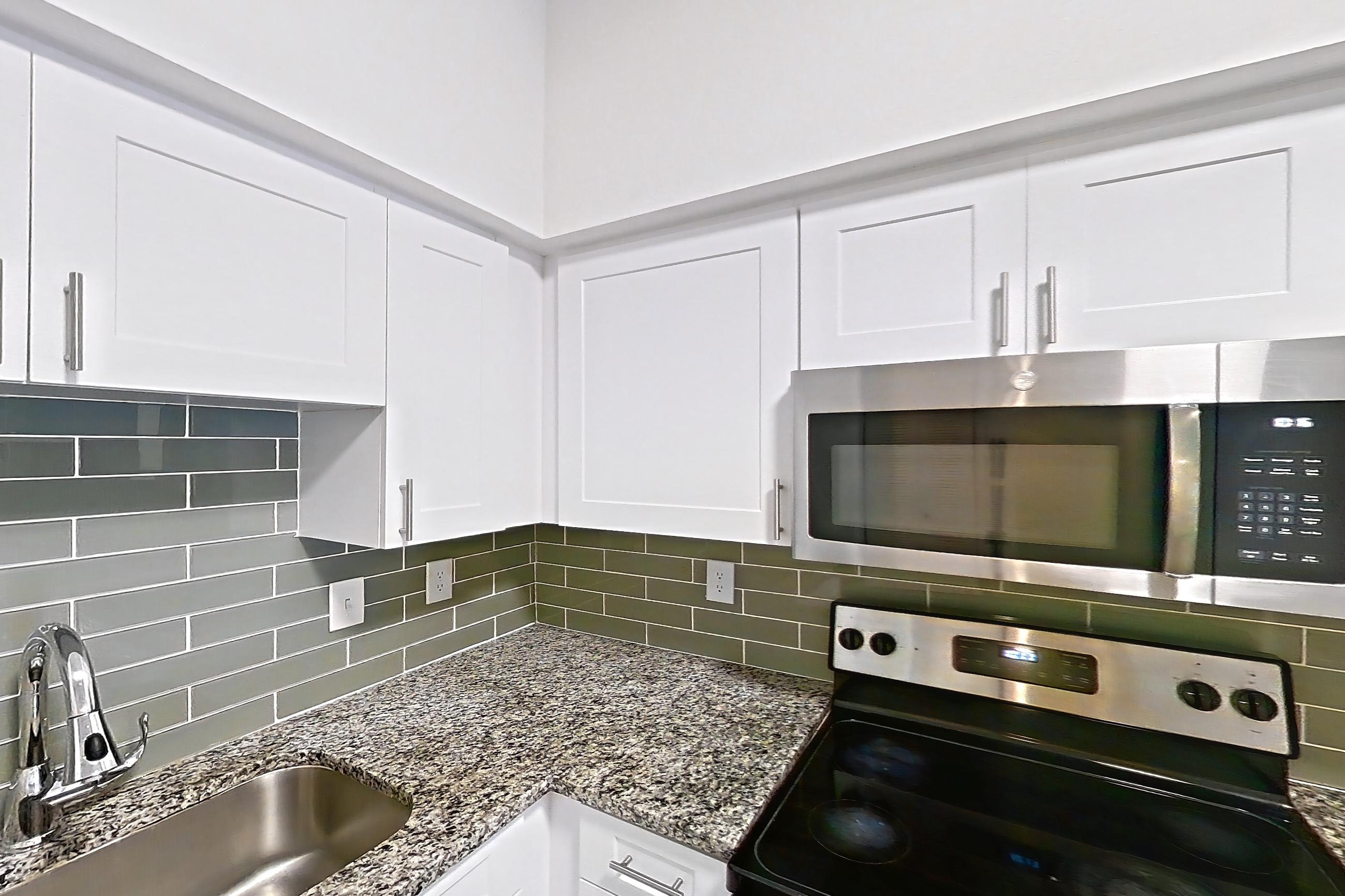 Kitchen in Apartment 12-102 at Solano at Miramar, 1B floor plan