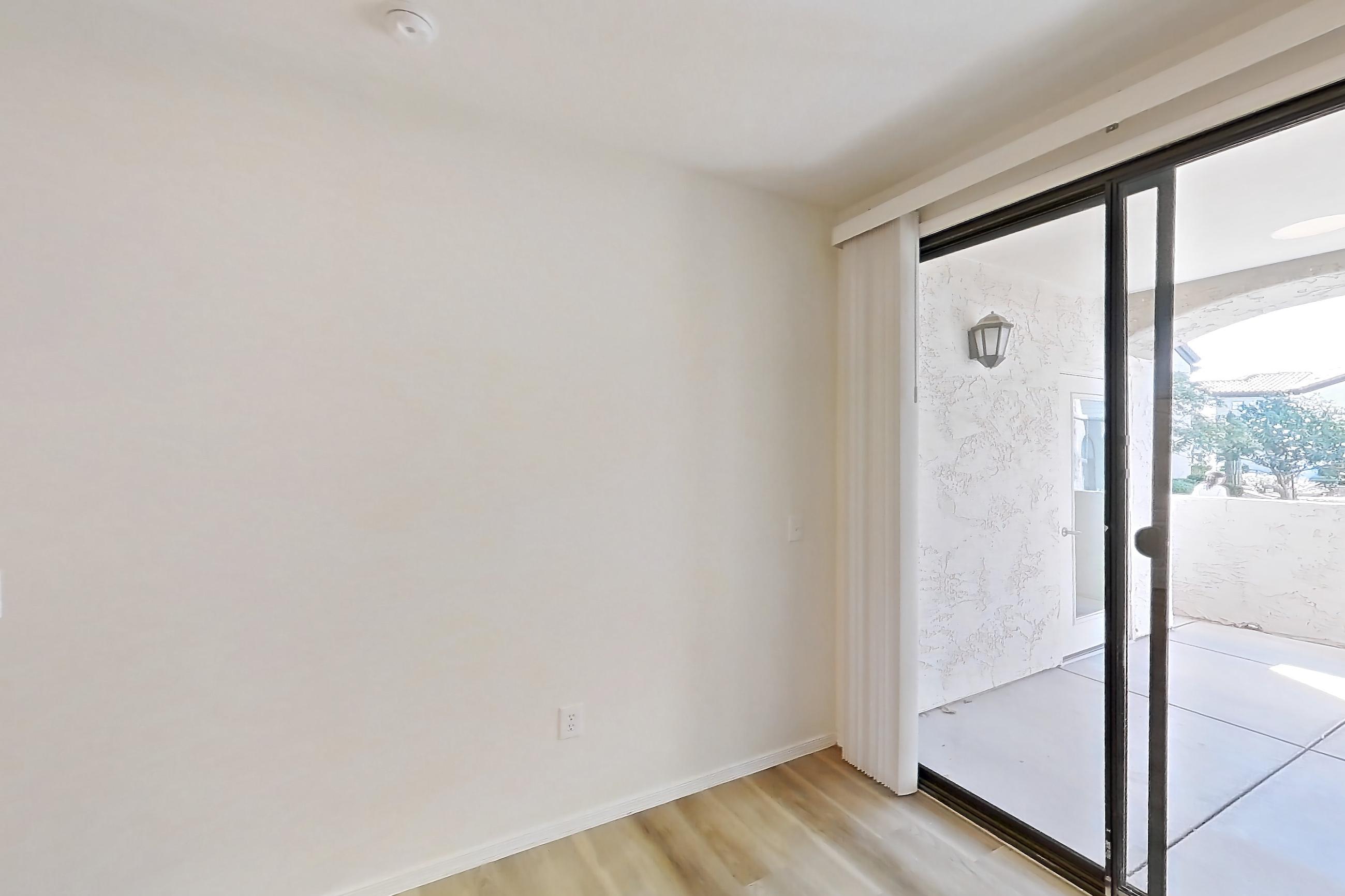 Dining room with light wood-finish flooring, Apartment 1035 at Dobson 2222