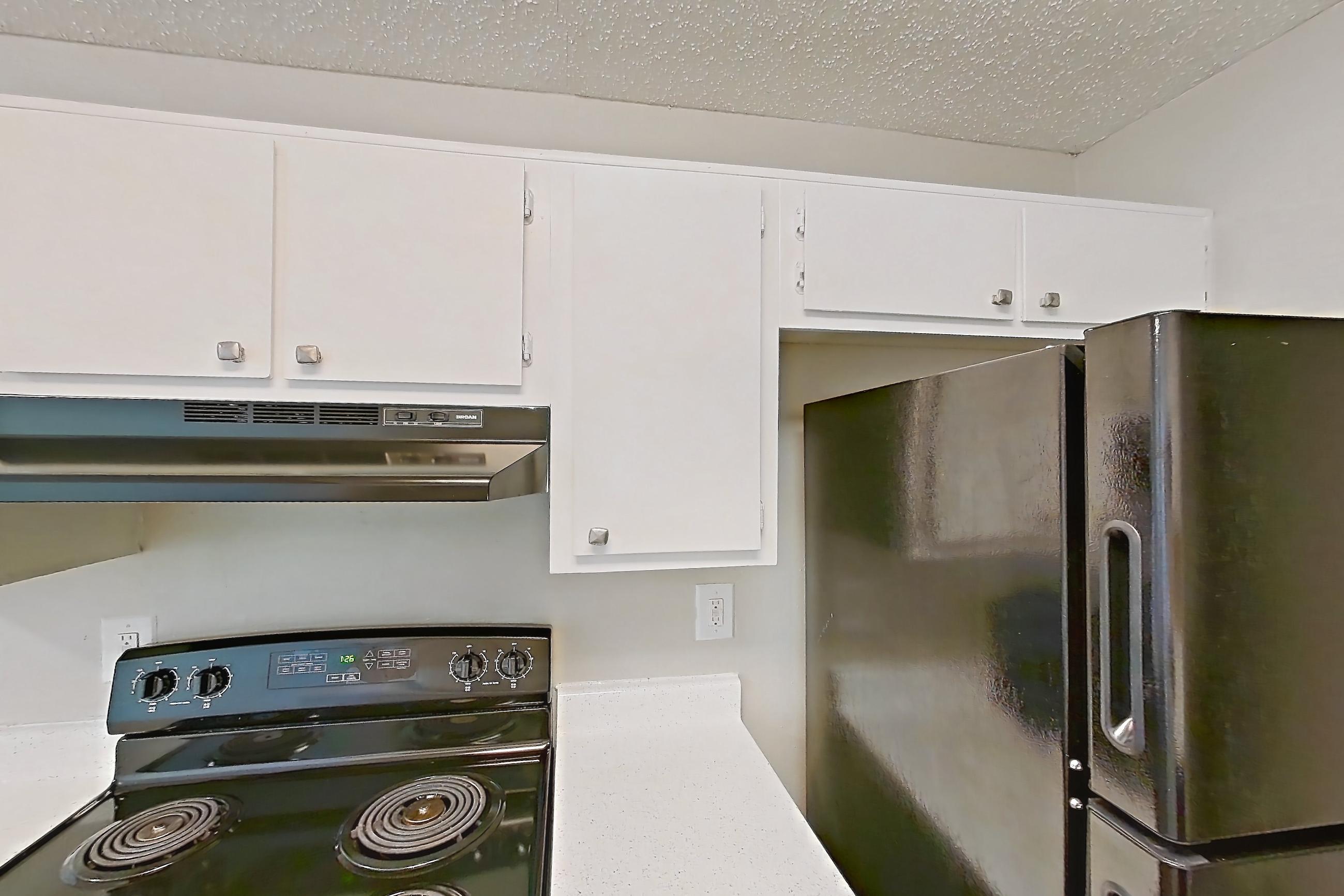Kitchen in Apartment 2023 at Arbor Creek, A5 floor plan