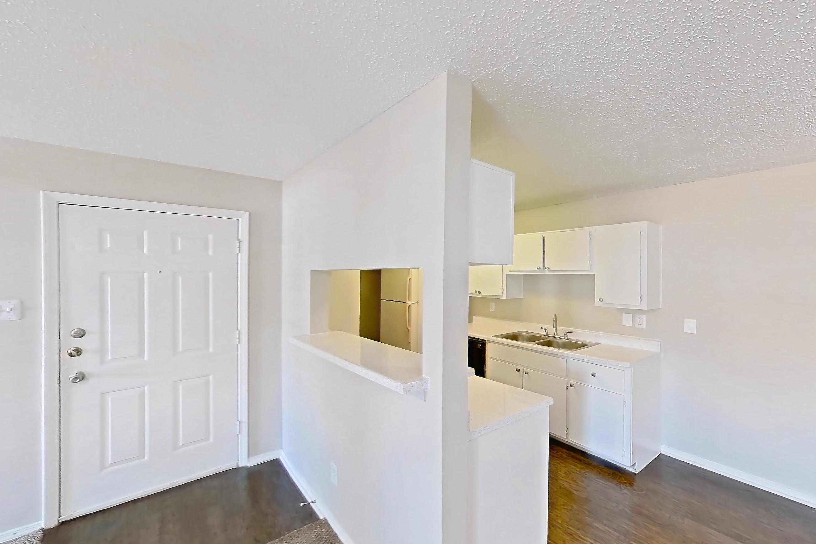 Living room in Apartment 1324 at Arbor Creek, B2 floor plan