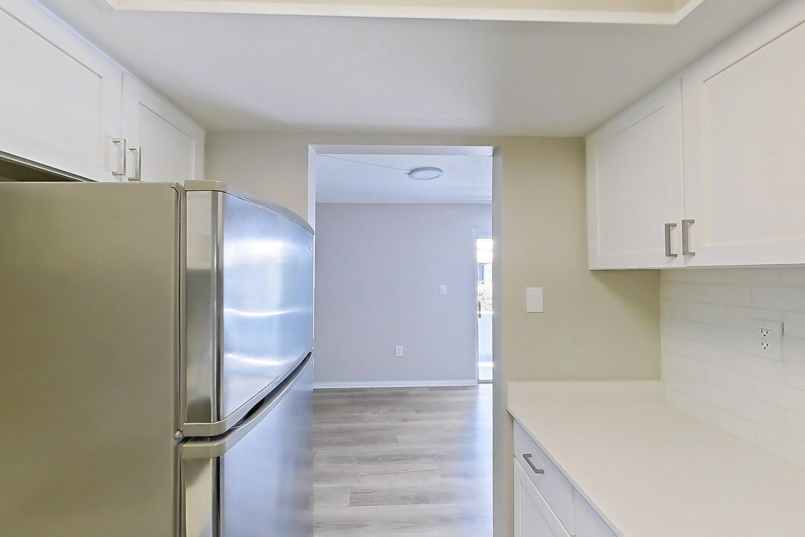 Kitchen in Apartment 204 at Venue at Winter Park, A1P Upgrade floor plan