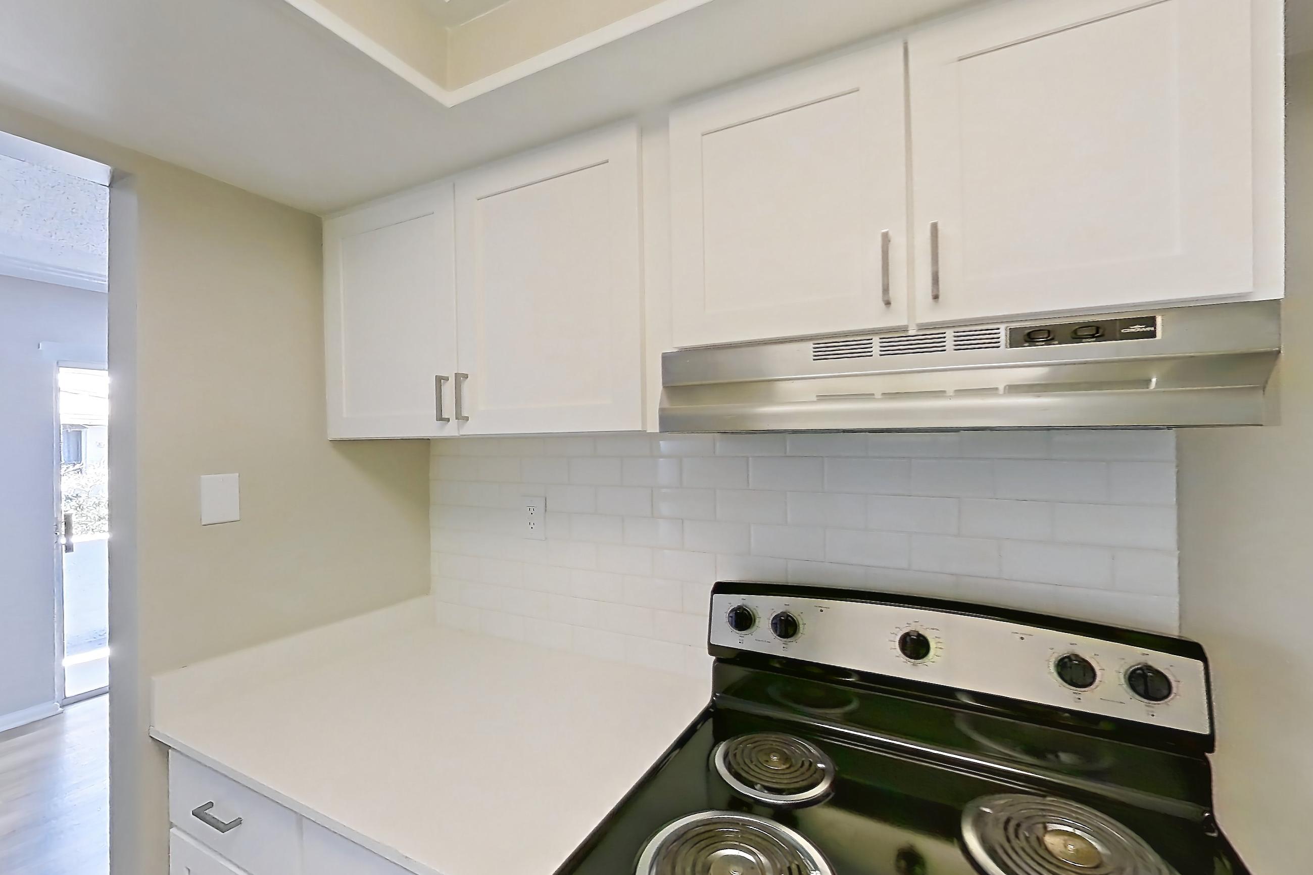 Kitchen in Apartment 204 at Venue at Winter Park, A1P Upgrade floor plan