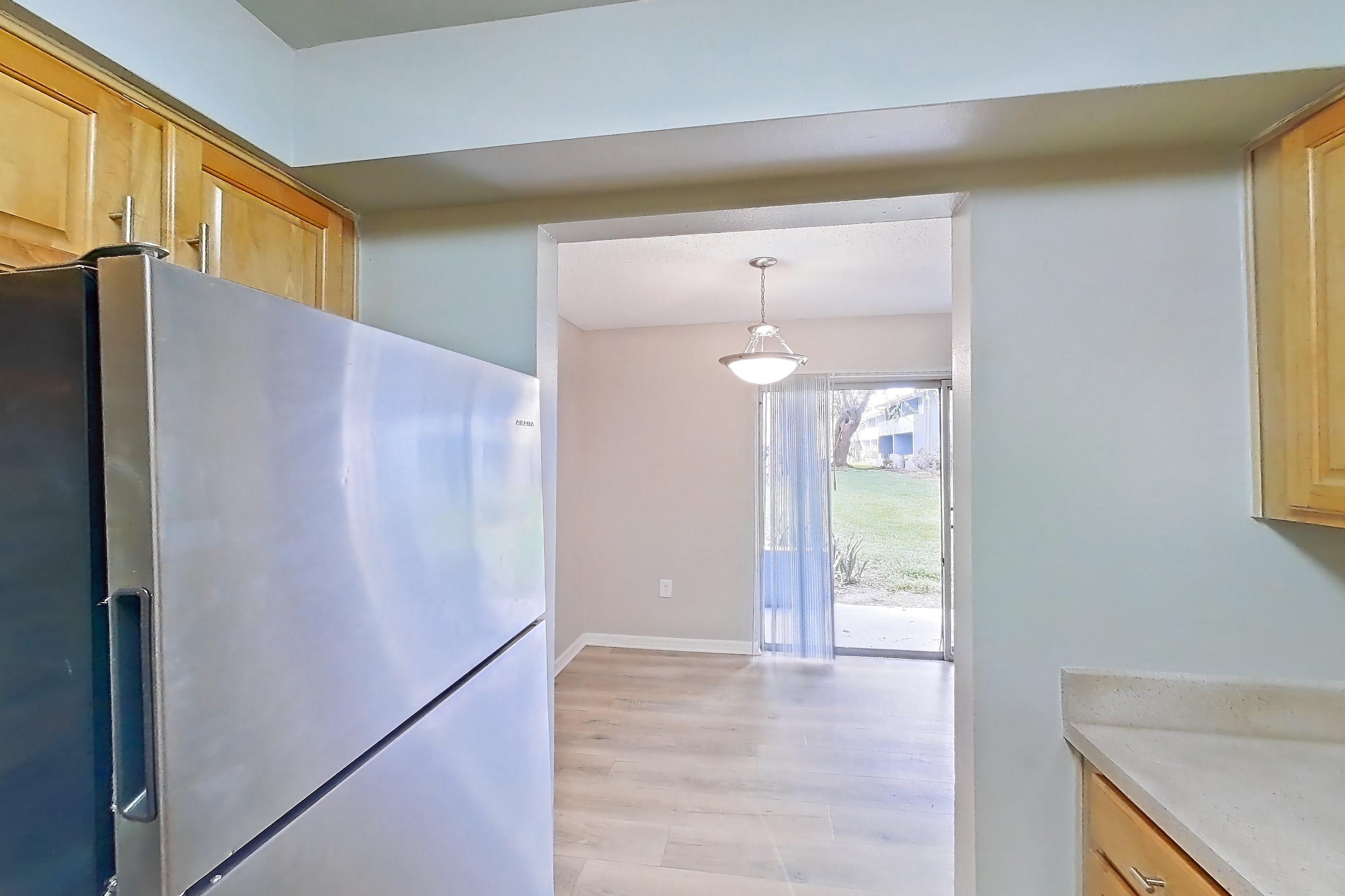 Kitchen in Apartment 43 at Venue at Winter Park, C1P floor plan