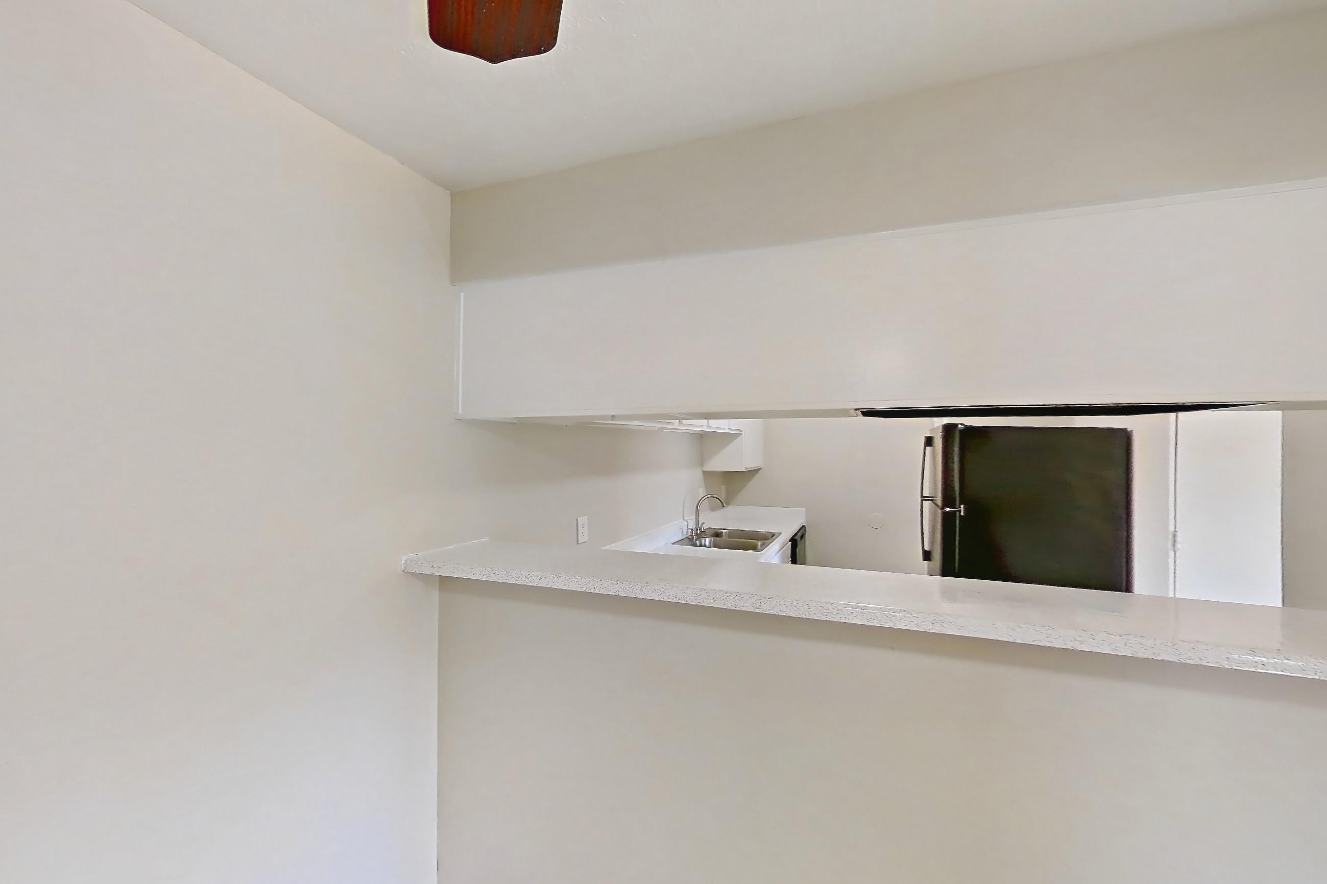 Dining room with refrigerator, Apartment 2328 at Westgate