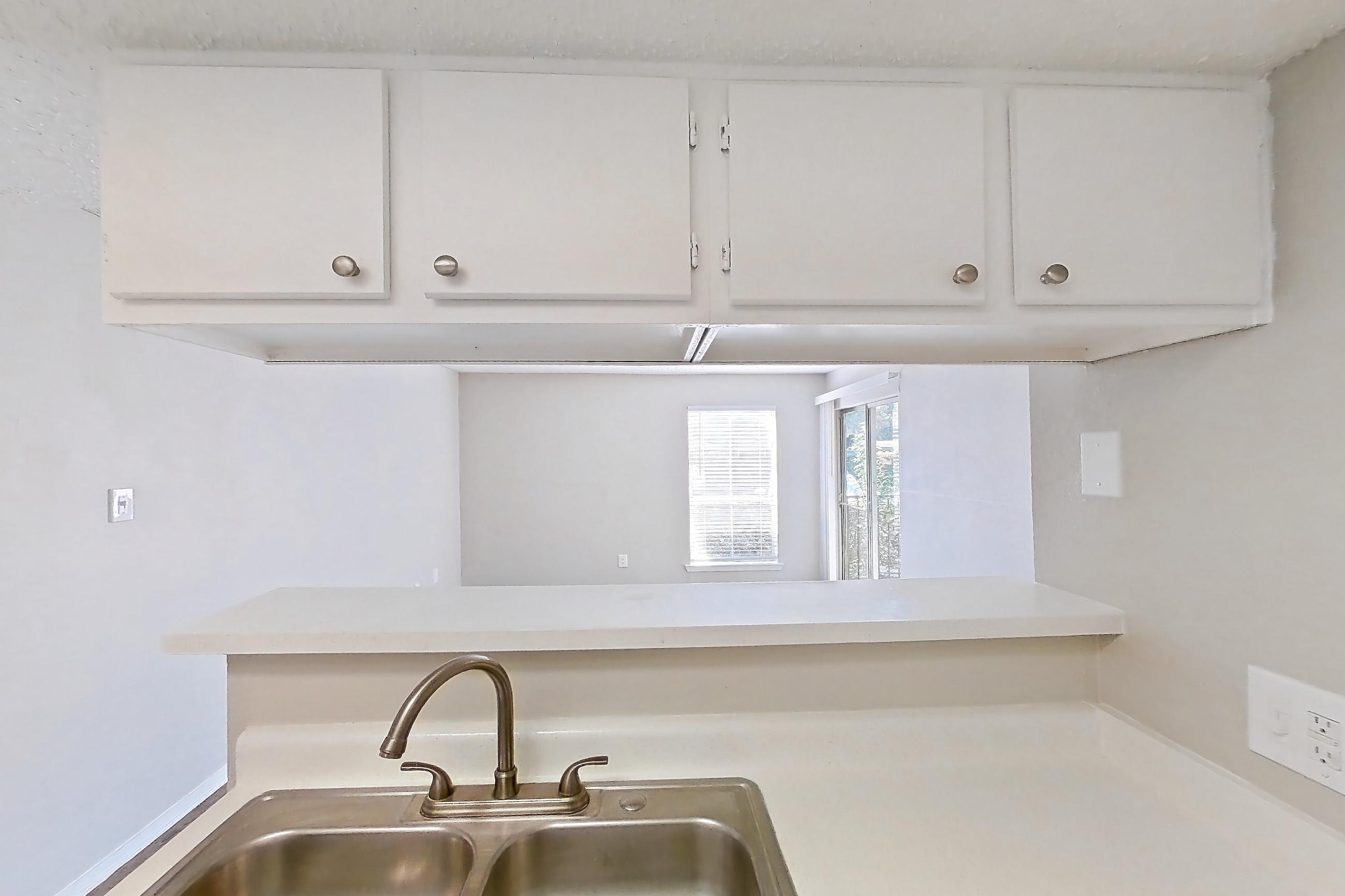 Kitchen in Apartment 101 at Enclave at Prestonwood, A1 Traditional floor plan