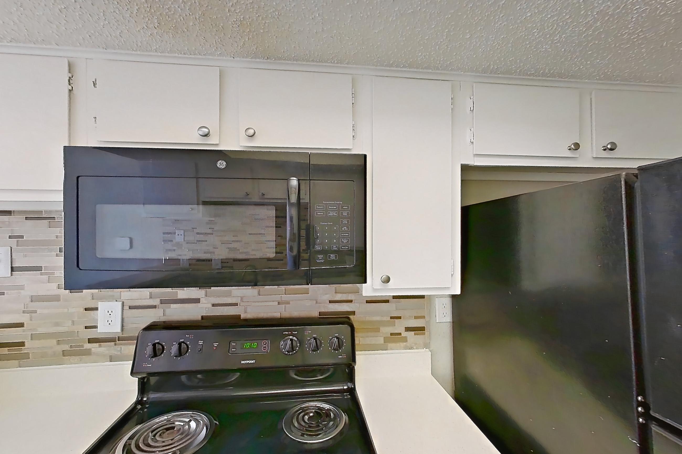 Kitchen in Apartment 2095 at Enclave at Prestonwood, A2 Traditional floor plan