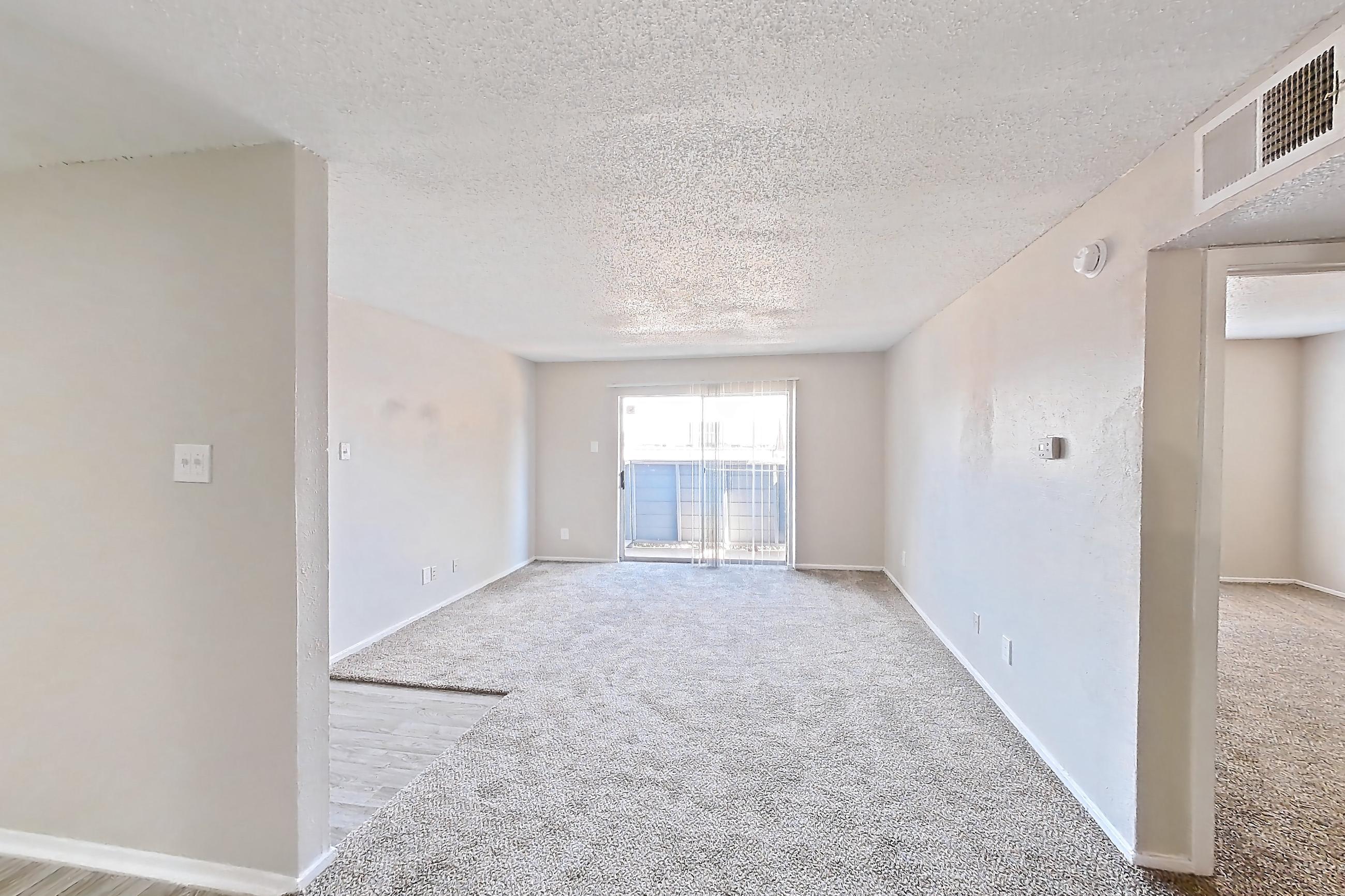 Dining room with black appliances, electric range, oven/range, and refrigerator, Apartment 601 at Westgate