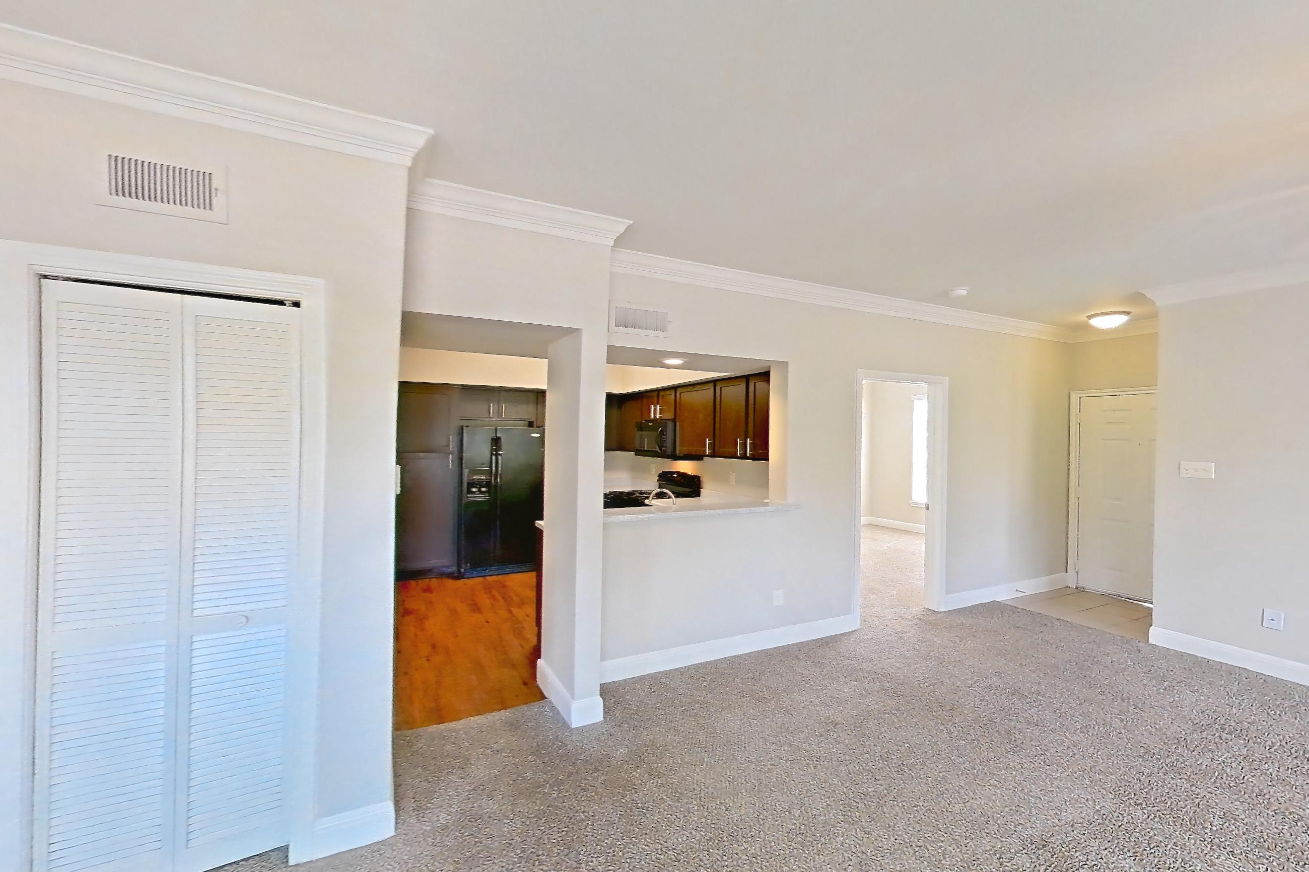 Living space in a 2 Bedroom - 2 Bath floor plan unit, representative of Unit 1204 at Champions Park