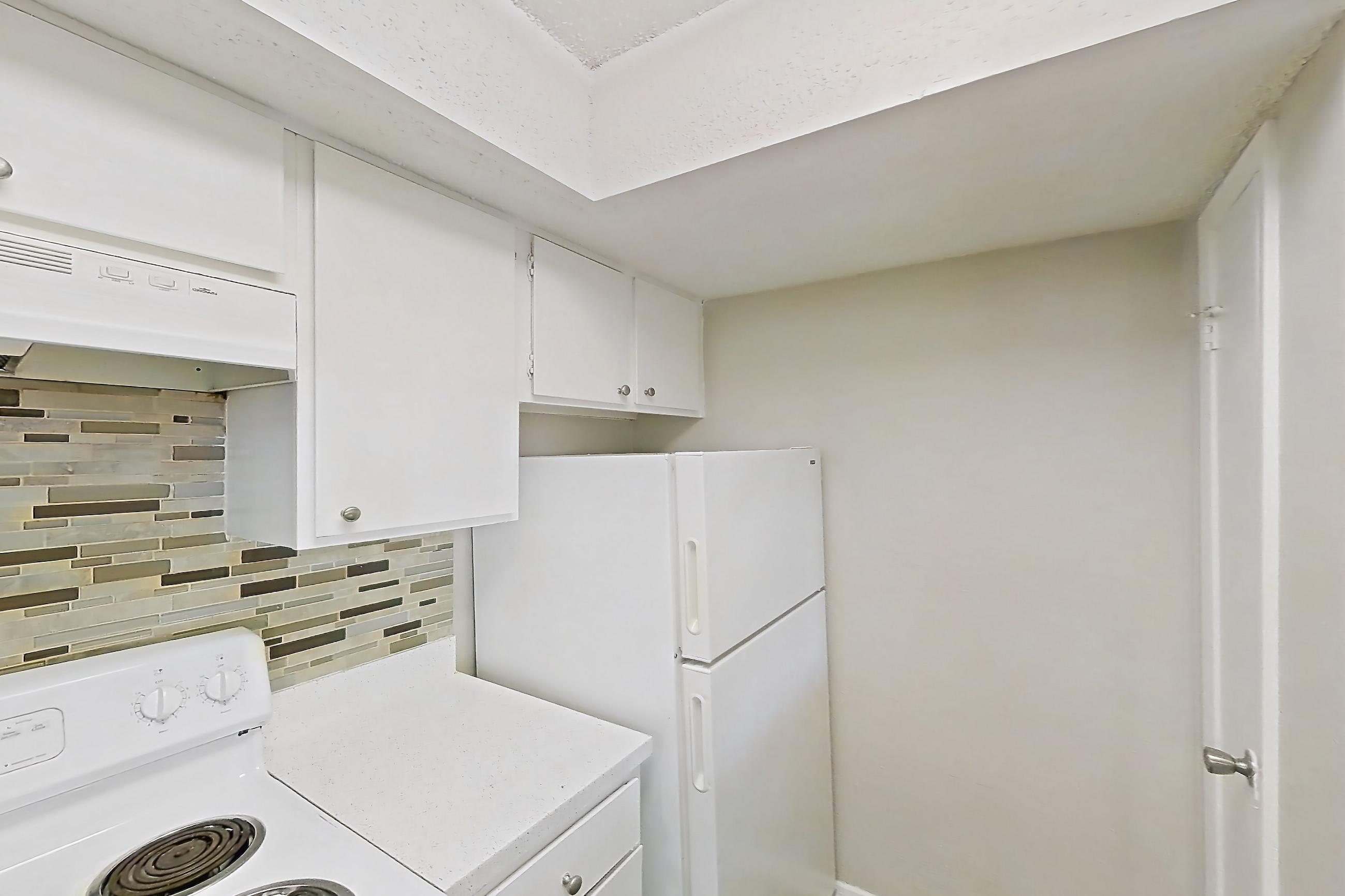 Kitchen in Apartment 1114 at Enclave at Prestonwood, B1 Traditional floor plan