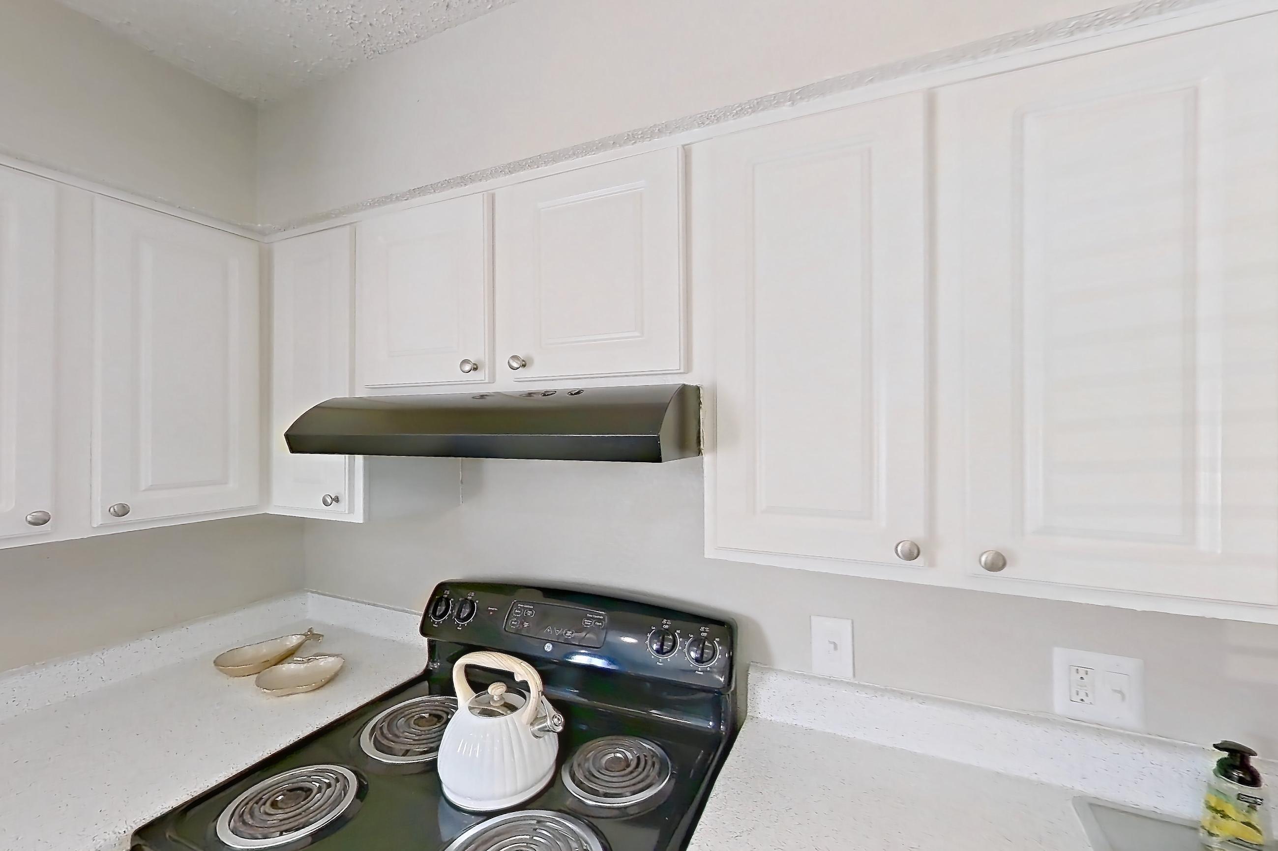 Kitchen in Apartment 0105 at Prestonwood Apartment Homes, B4 floor plan