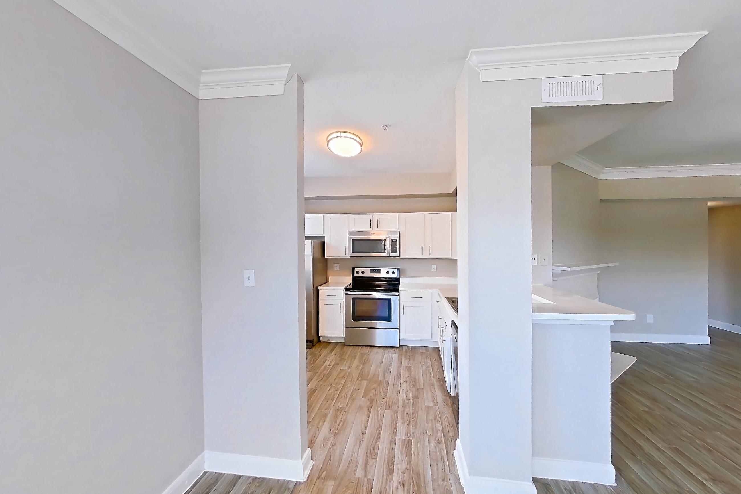Dining room in a B2 floor plan apartment, representative of Apartment 403 at Champions Centre