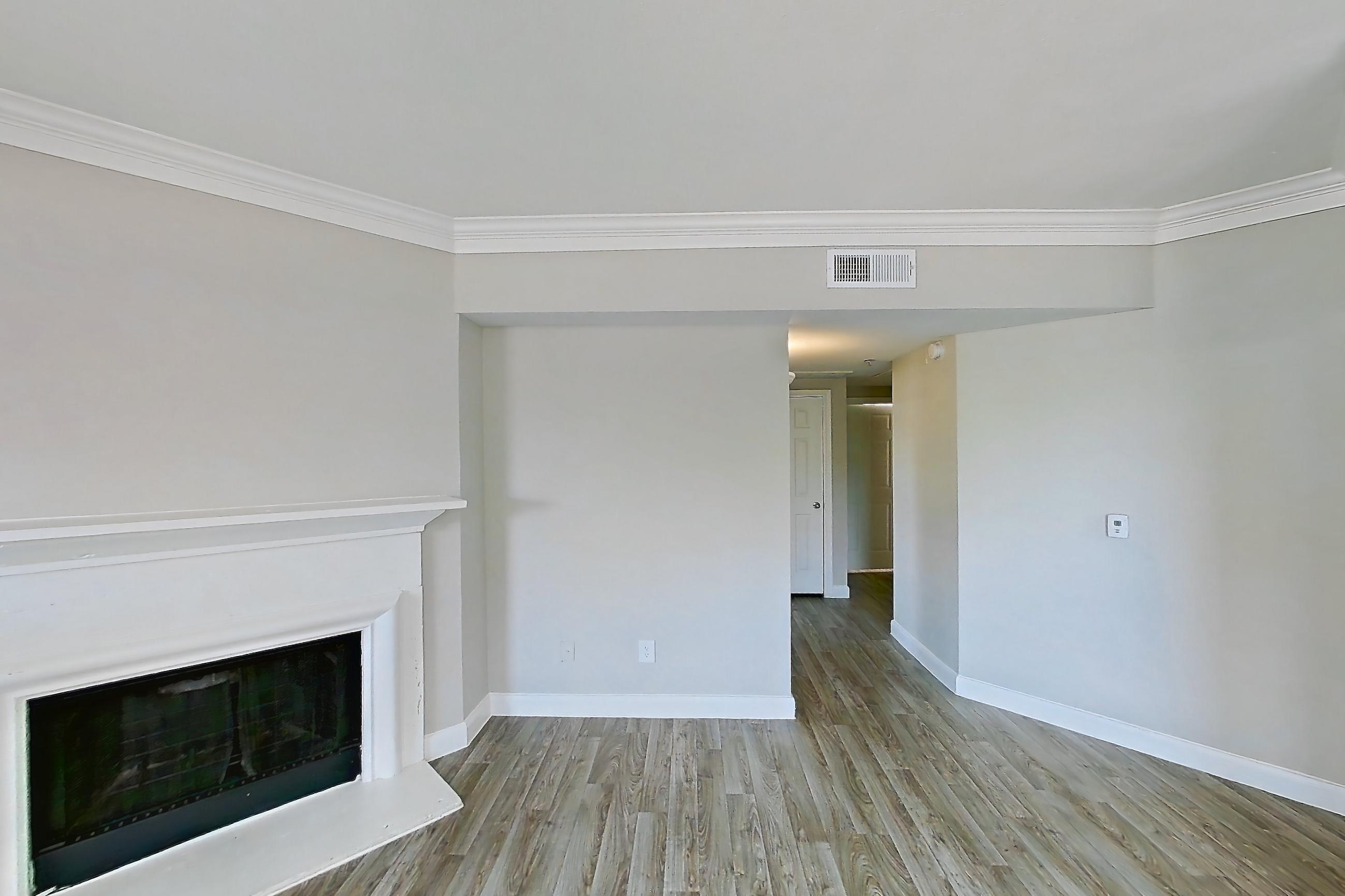 Living room in a B2 floor plan apartment, representative of Apartment 403 at Champions Centre