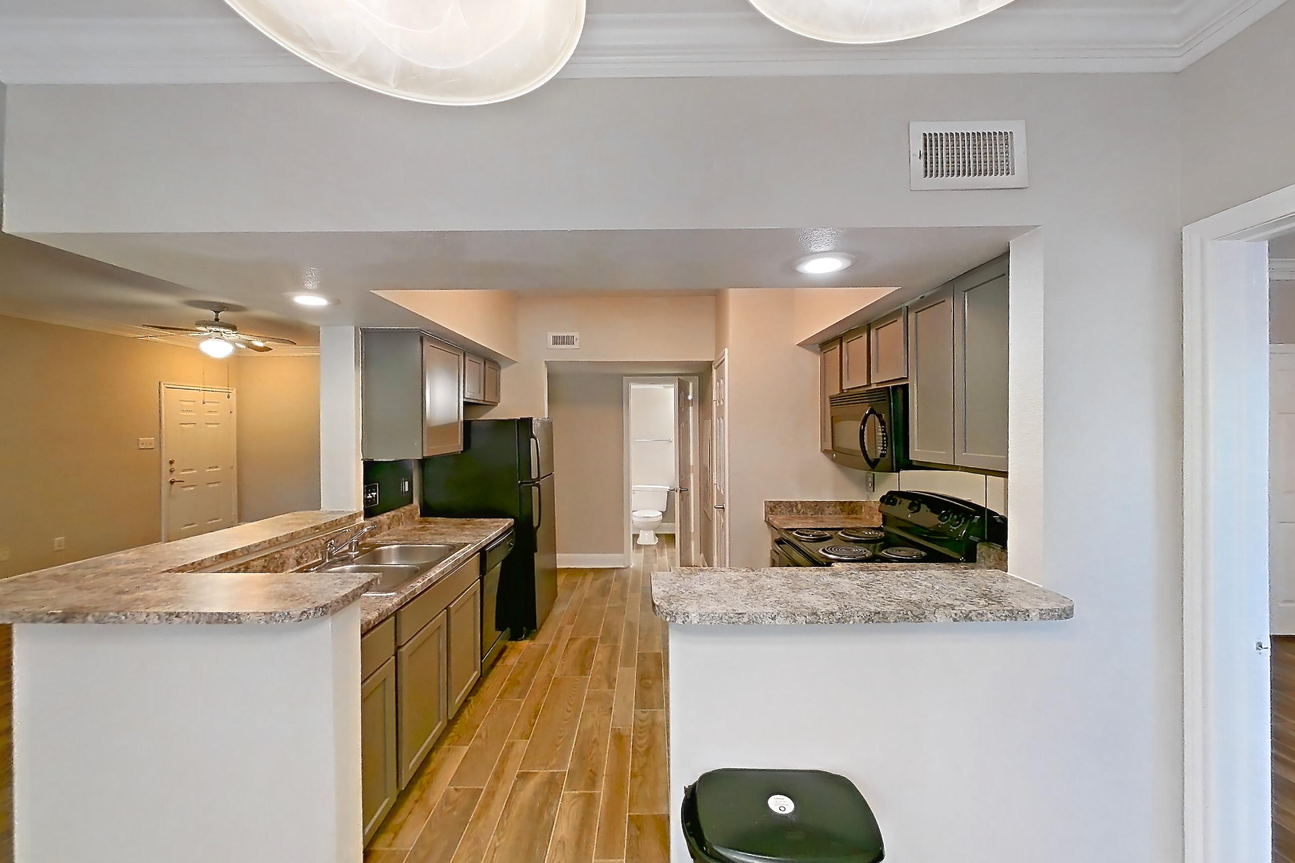 Dining room in a 1 Bedroom - 1 Bath floor plan unit, representative of Unit 0405 at Champions Park