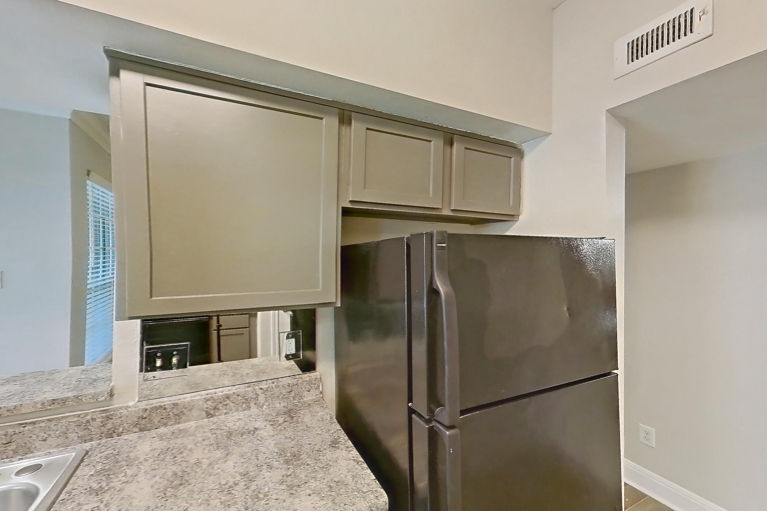 Kitchen in a 1 Bedroom - 1 Bath floor plan unit, representative of Unit 0405 at Champions Park