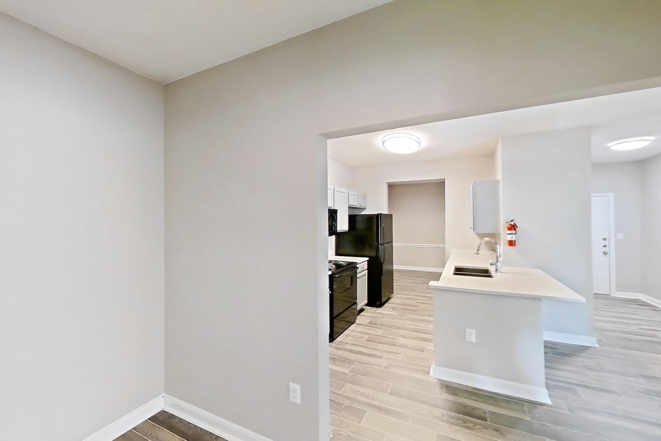 Living space in a Belmont (1,282 sq ft) floor plan apartment, representative of Apartment 404 at Grand Palms