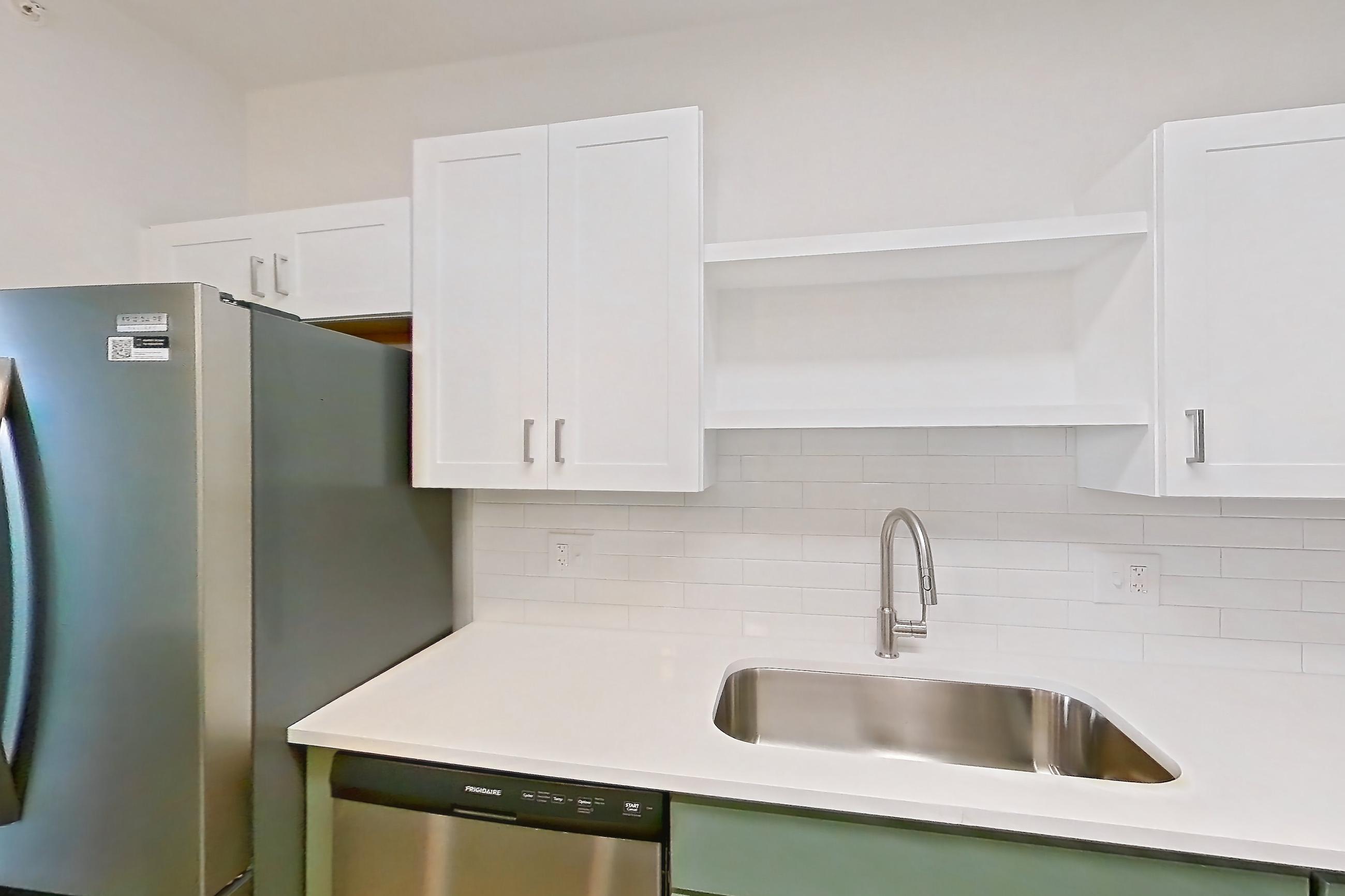 Kitchen in a Haven Upgrade floor plan apartment, representative of Apartment 109 at Talcott at Windermere