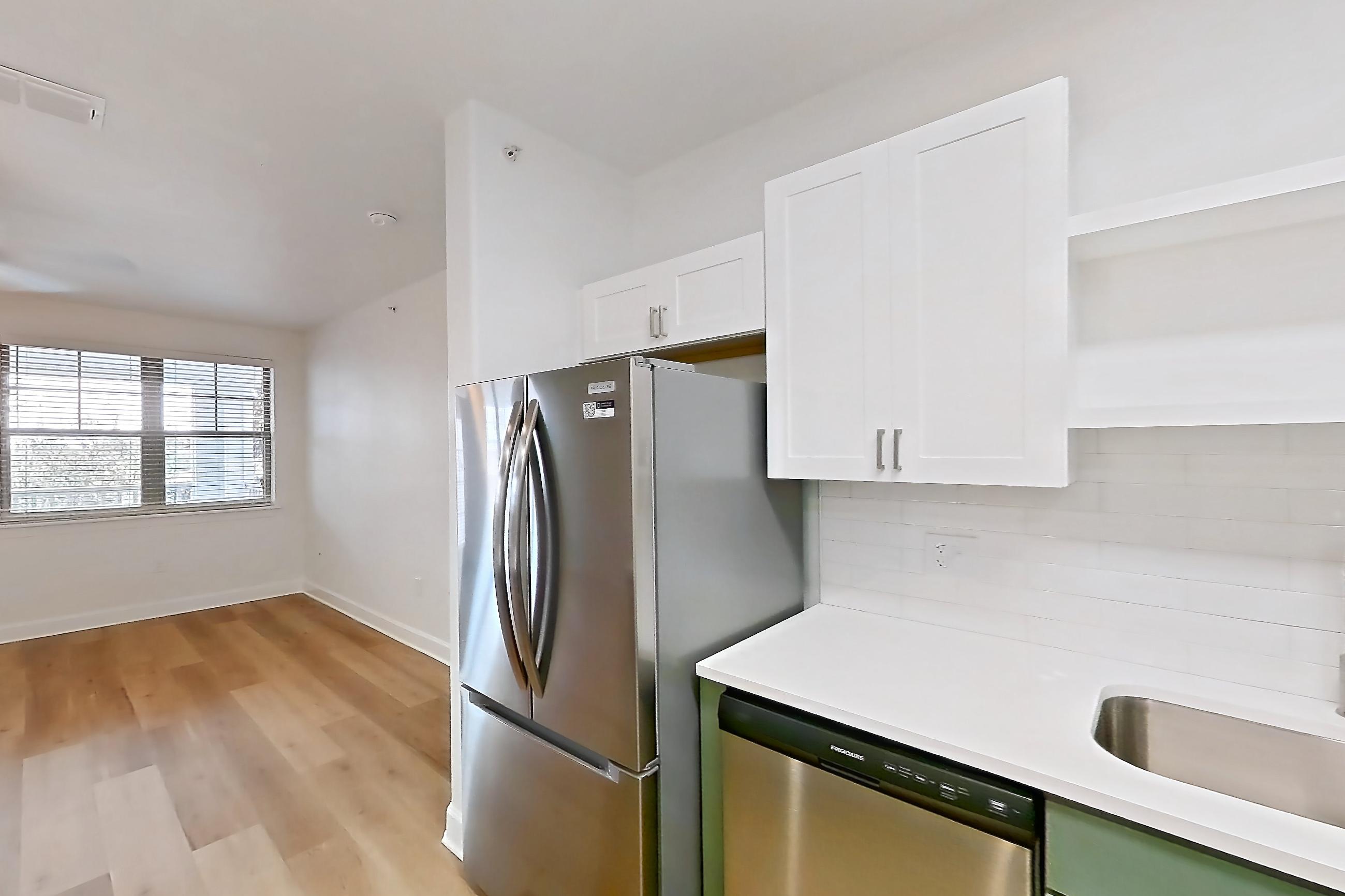 Kitchen in a Sanctuary with Balcony Upgrade floor plan apartment, representative of Apartment 208 at Talcott at Windermere
