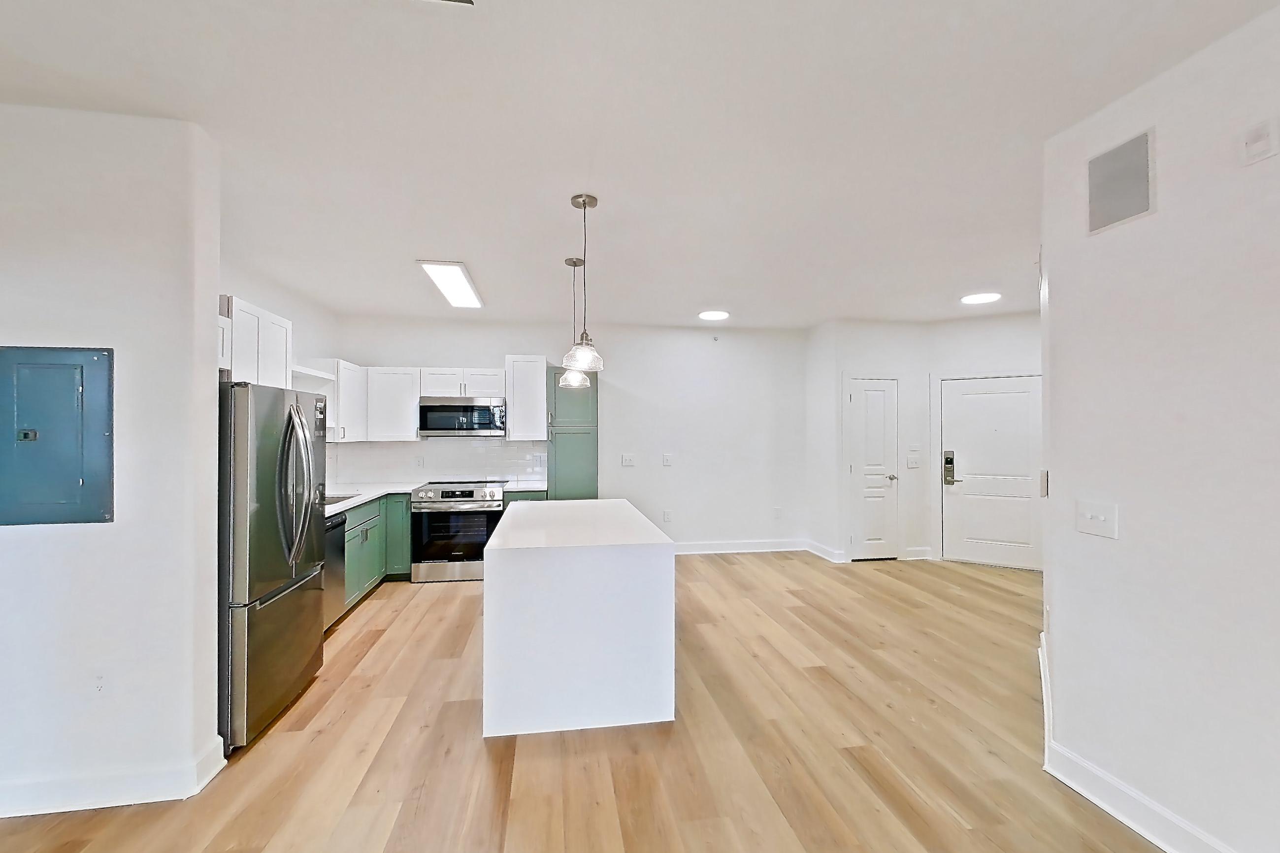 Living room in a Sanctuary with Balcony Upgrade floor plan apartment, representative of Apartment 208 at Talcott at Windermere