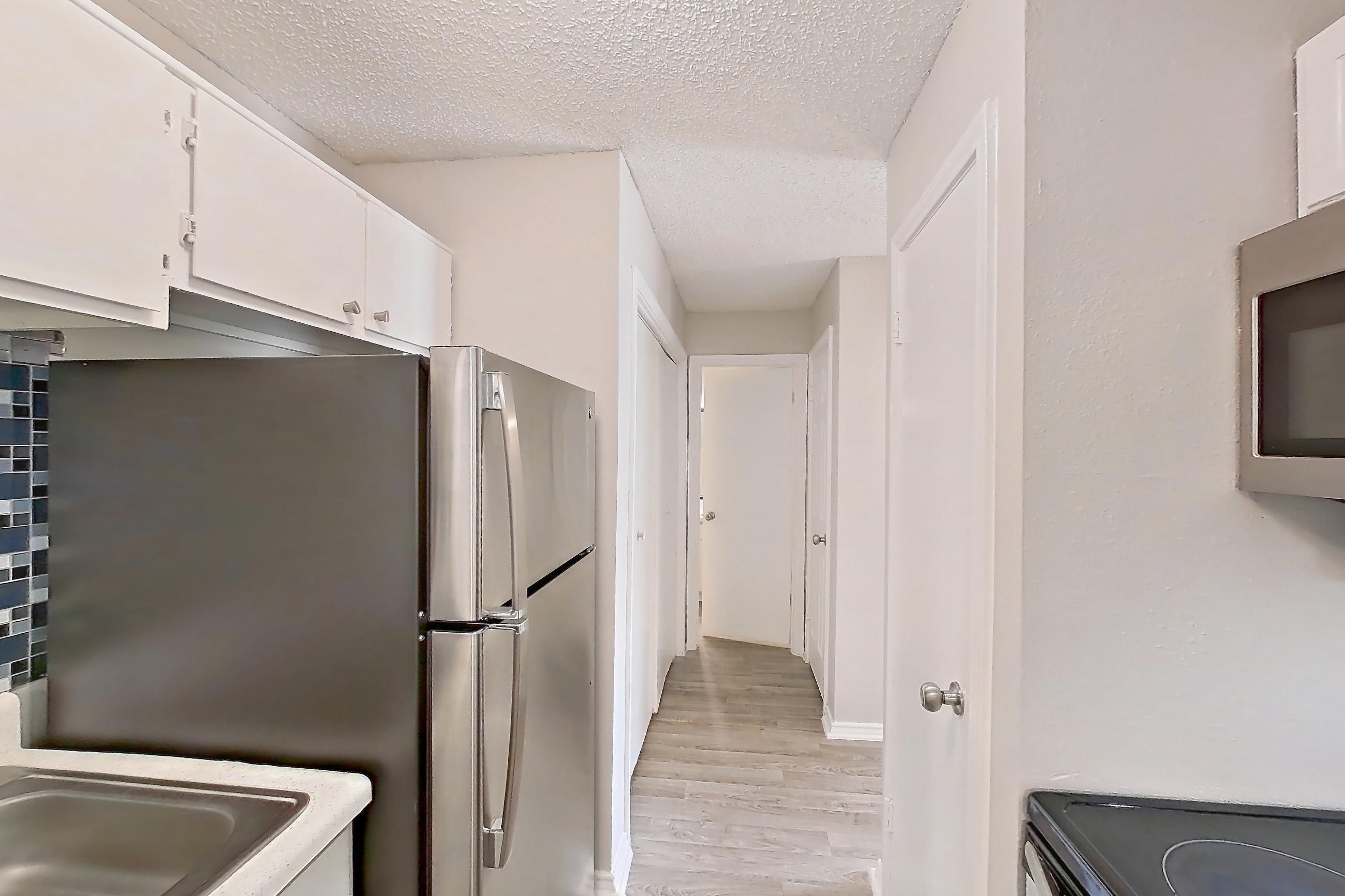 Kitchen in Apartment 2801p at The Carmel, B1 floor plan