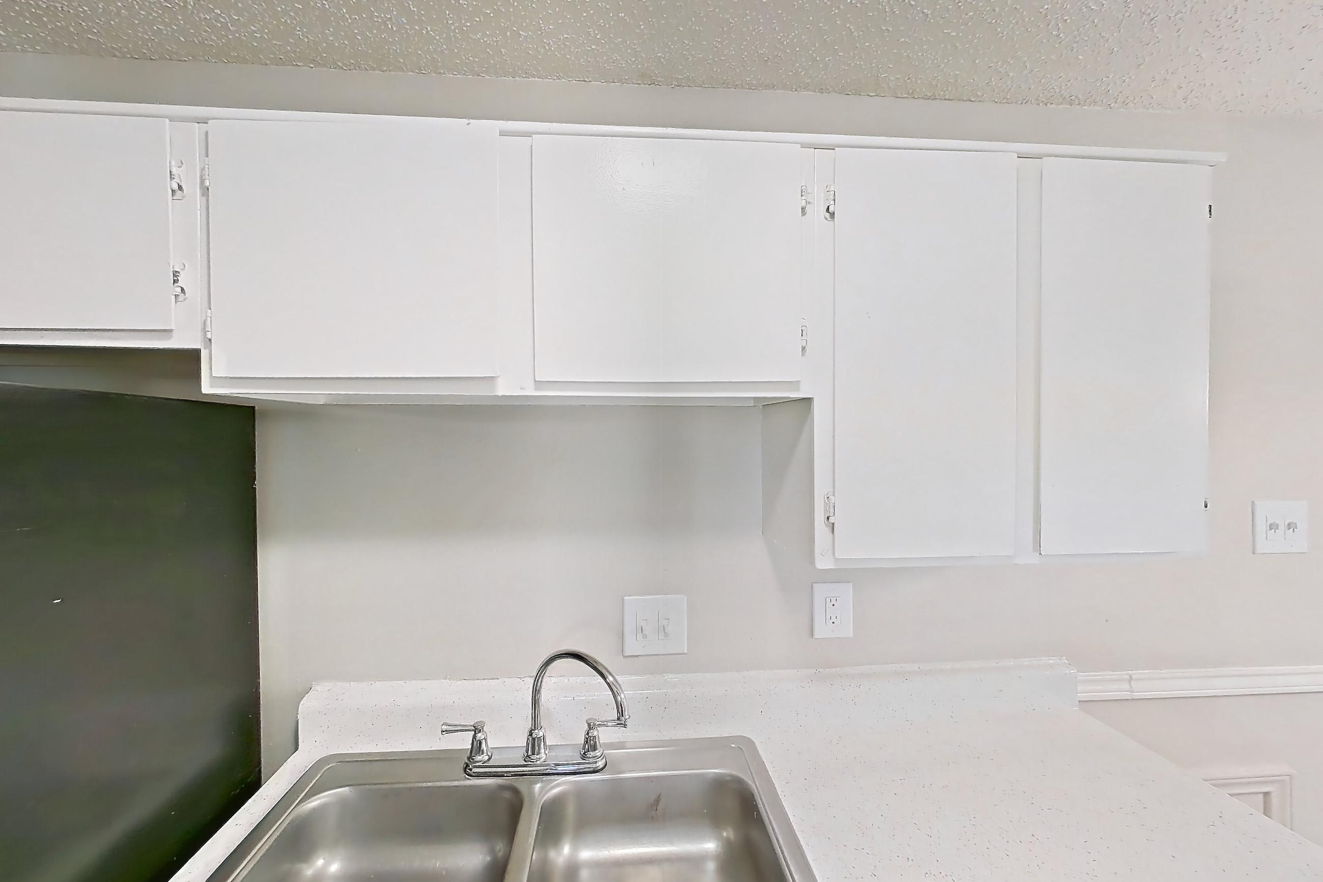 Kitchen in a B1 floor plan apartment, representative of Apartment 1002P at The Carmel