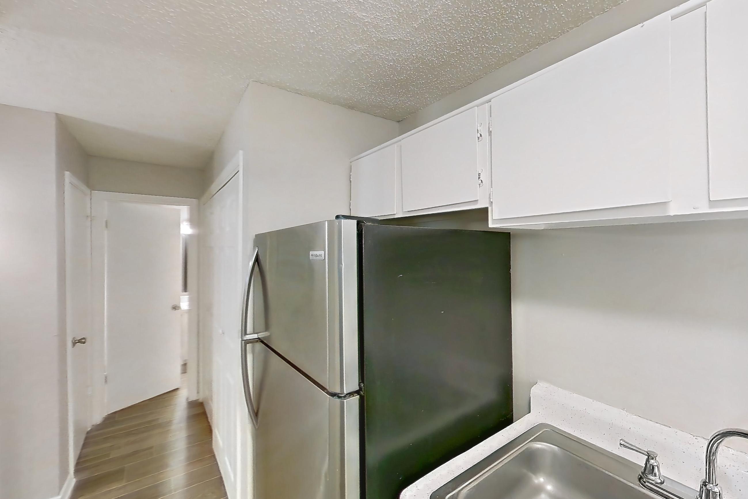 Kitchen in a B1 floor plan apartment, representative of Apartment 1002P at The Carmel