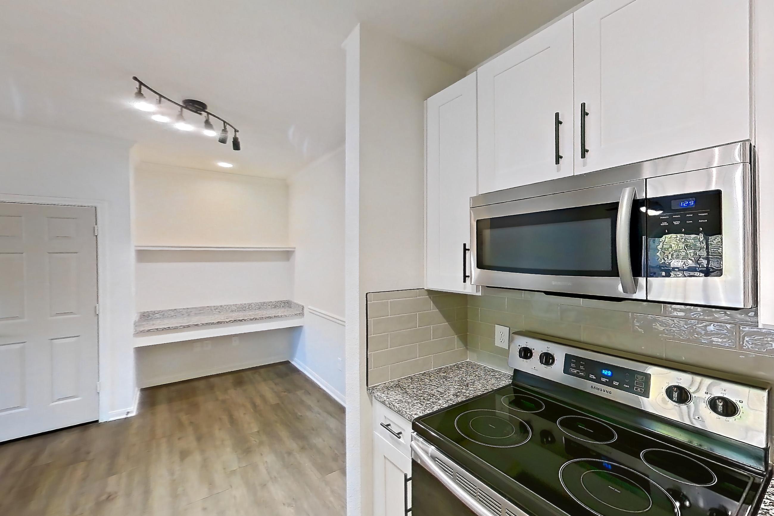 Kitchen in Apartment 2206 at Cortland at Twin Creeks, A1R - The Allenwood floor plan