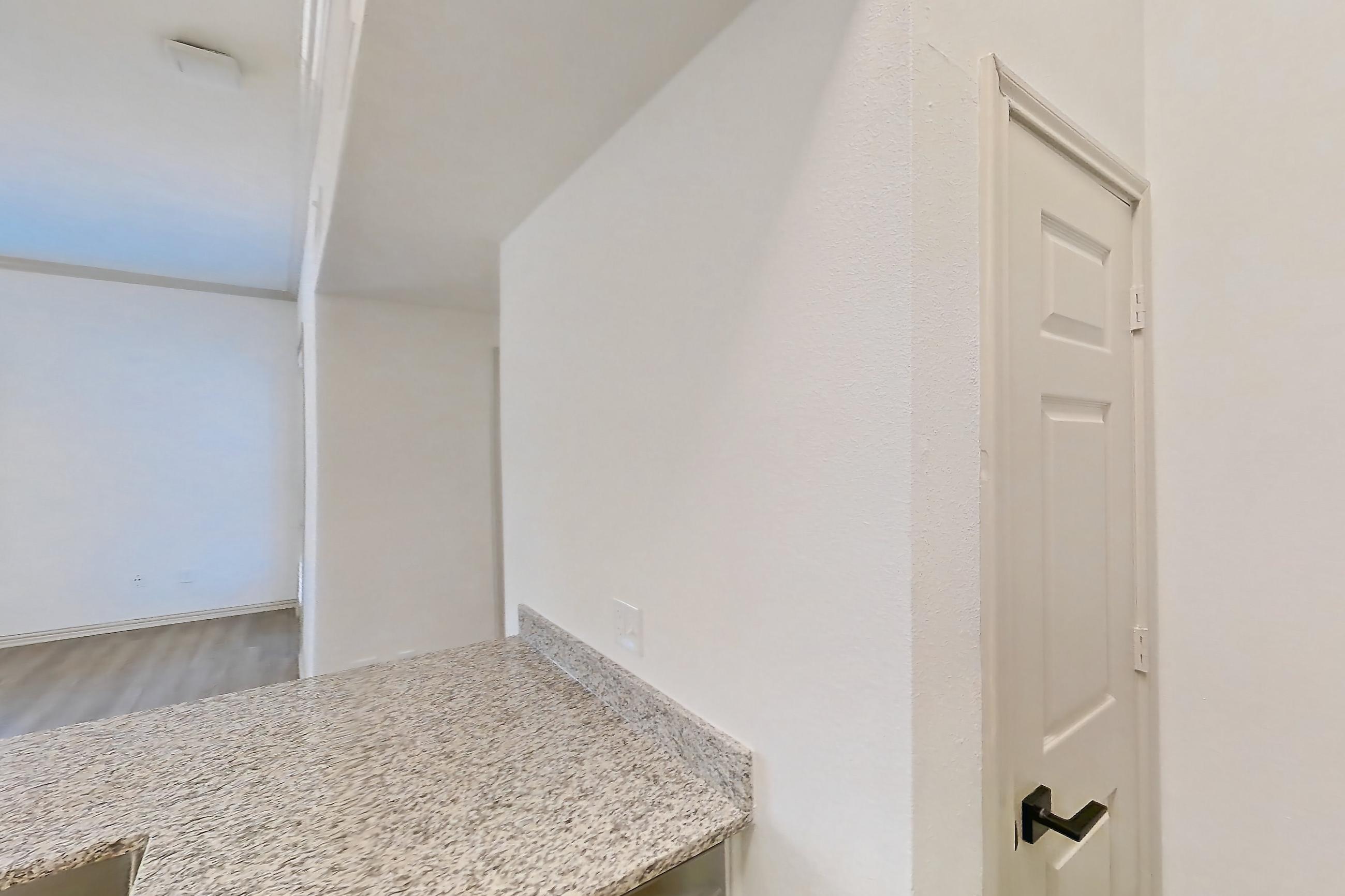 Kitchen in a A2R - Crossroads floor plan apartment, representative of Apartment 11209 at Cortland Wortham