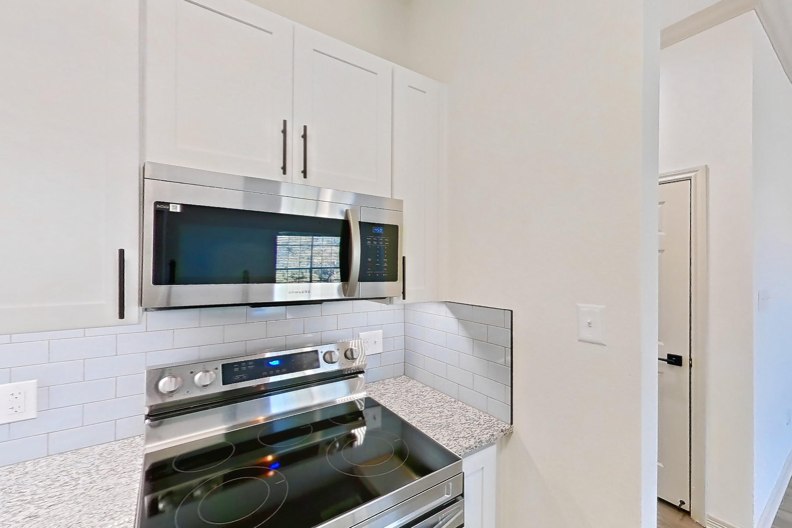 Kitchen in a A2R - Crossroads floor plan apartment, representative of Apartment 11209 at Cortland Wortham