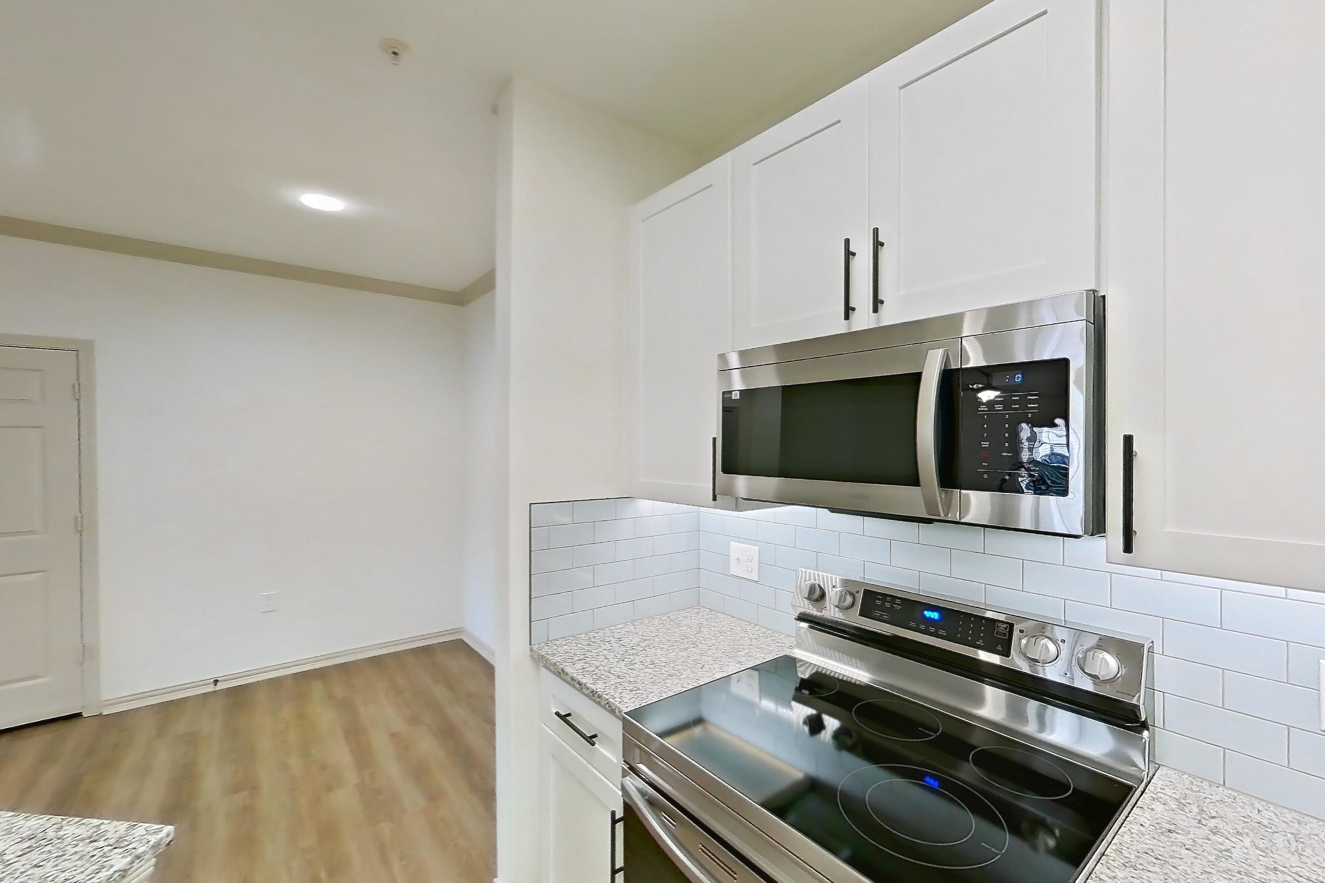 Kitchen in Apartment 16105 at Cortland Wortham, A3R - Copperfield floor plan