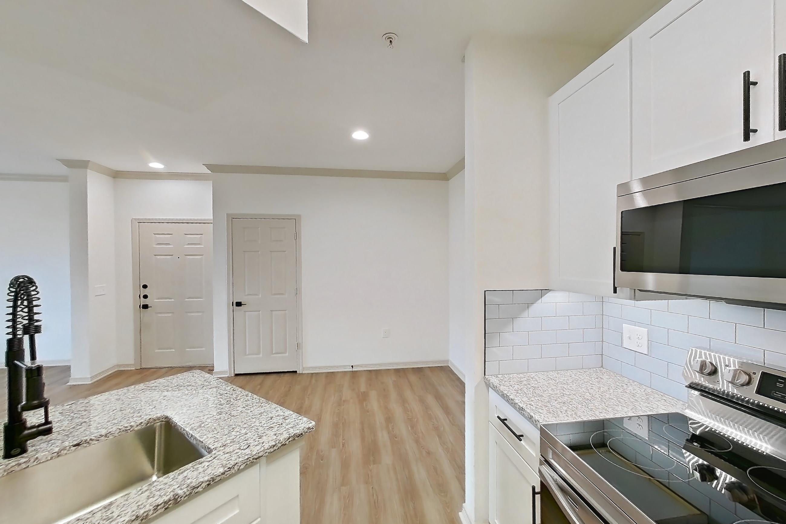 Kitchen in a A3R - Copperfield floor plan apartment, representative of Apartment 17110 at Cortland Wortham