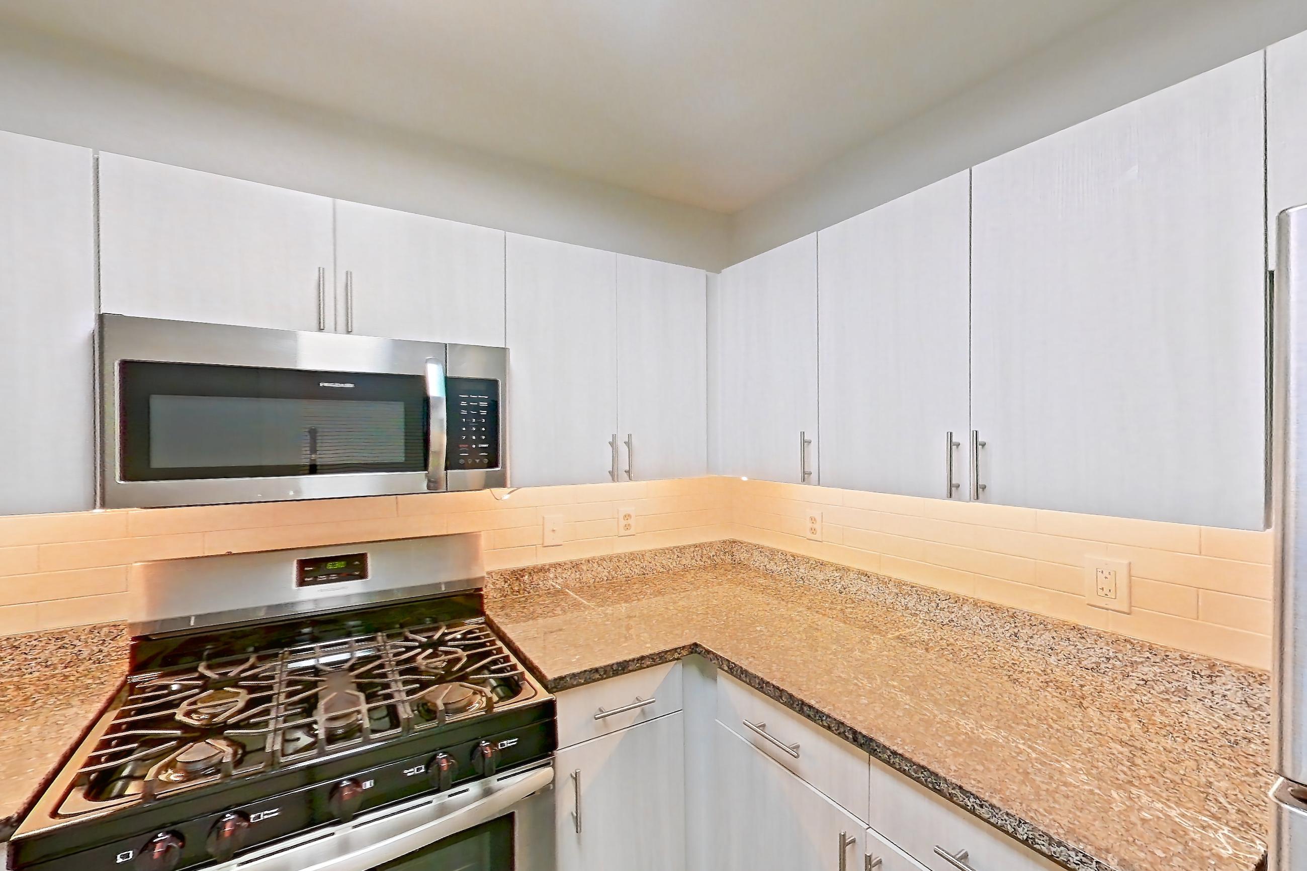 Kitchen in Apartment 646-d at Cortland at Dulles, A1R - Badland floor plan