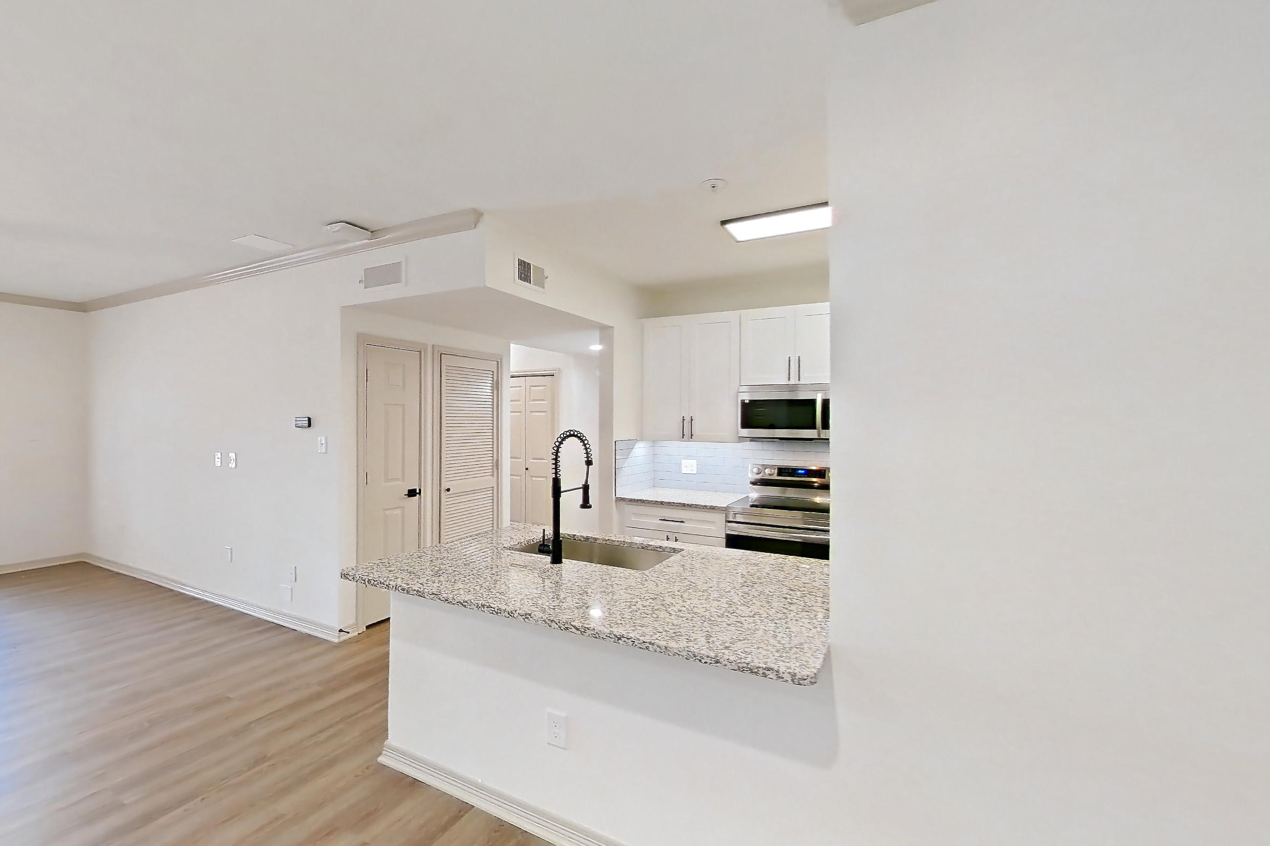 Dining room in a B1R - Cypress Falls floor plan apartment, representative of Apartment 3307 at Cortland Wortham