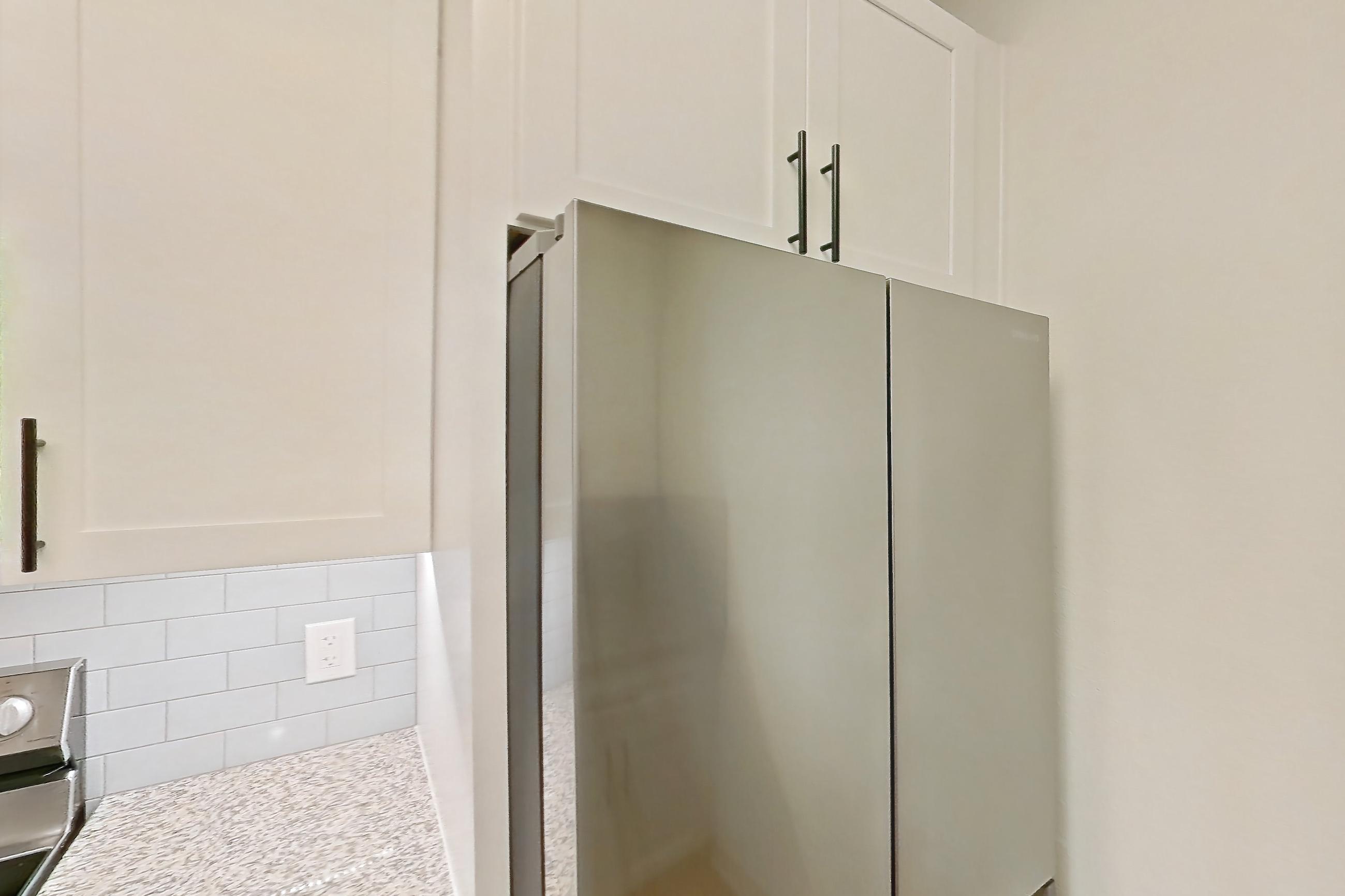 Kitchen in a B1R - Cypress Falls floor plan apartment, representative of Apartment 3307 at Cortland Wortham