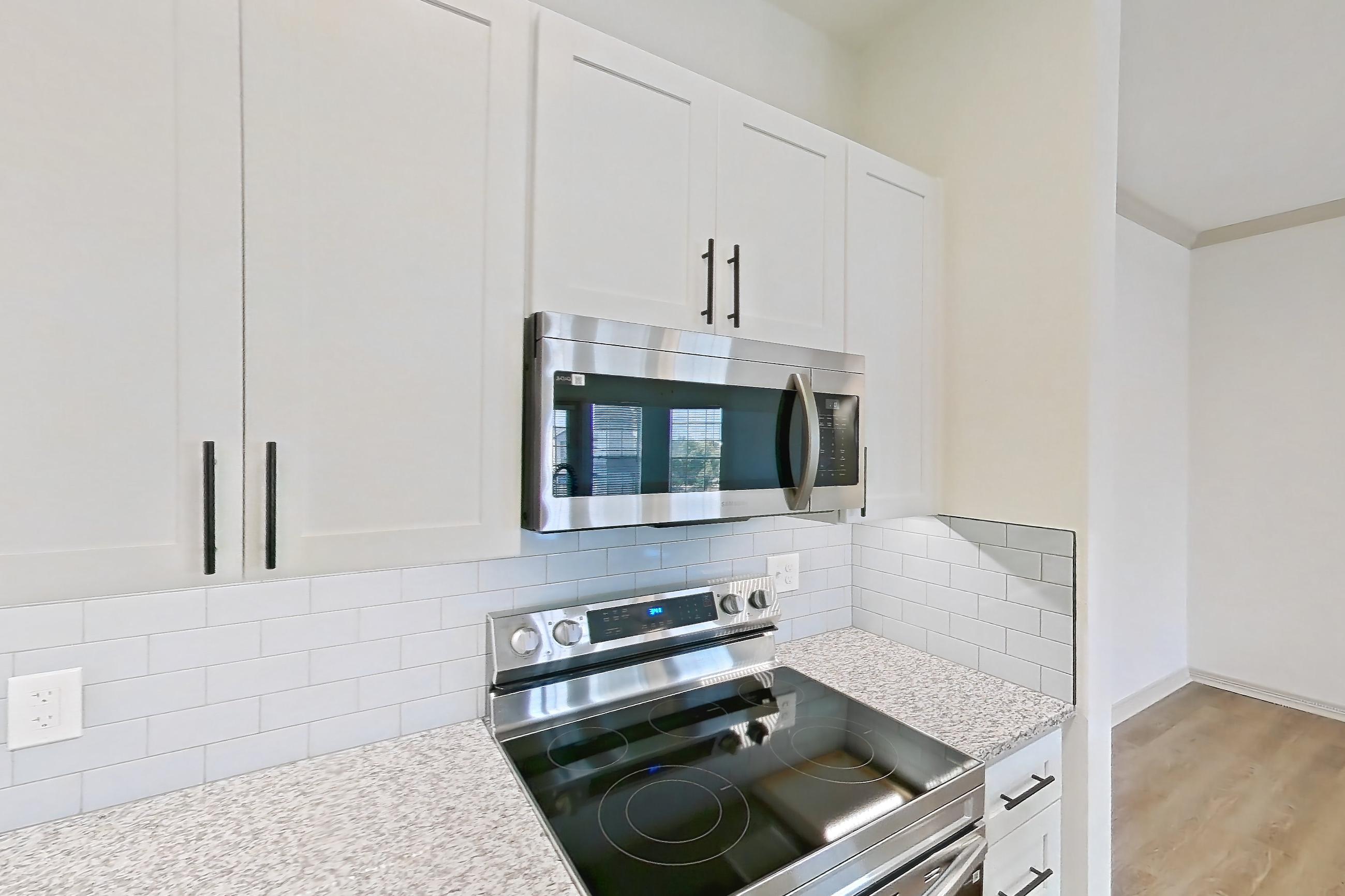 Kitchen in Apartment 12309 at Cortland Wortham, B2R - Stonegate floor plan