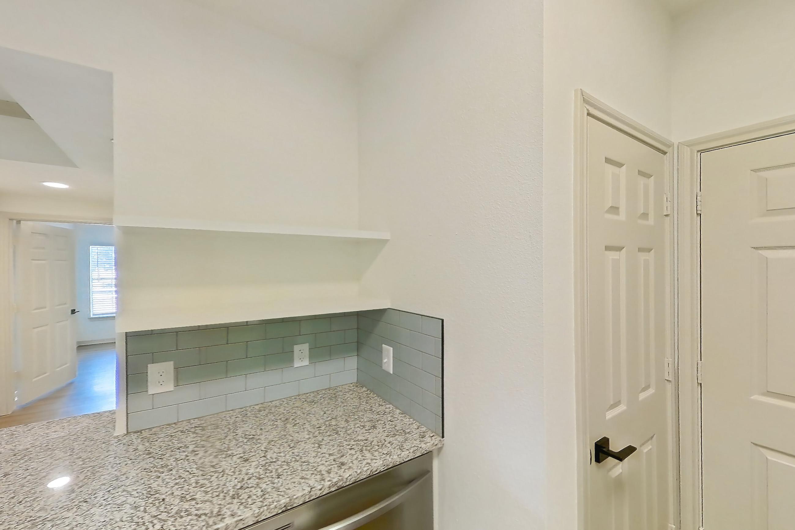 Kitchen in a B2R - Stonegate floor plan apartment, representative of Apartment 2309 at Cortland Wortham