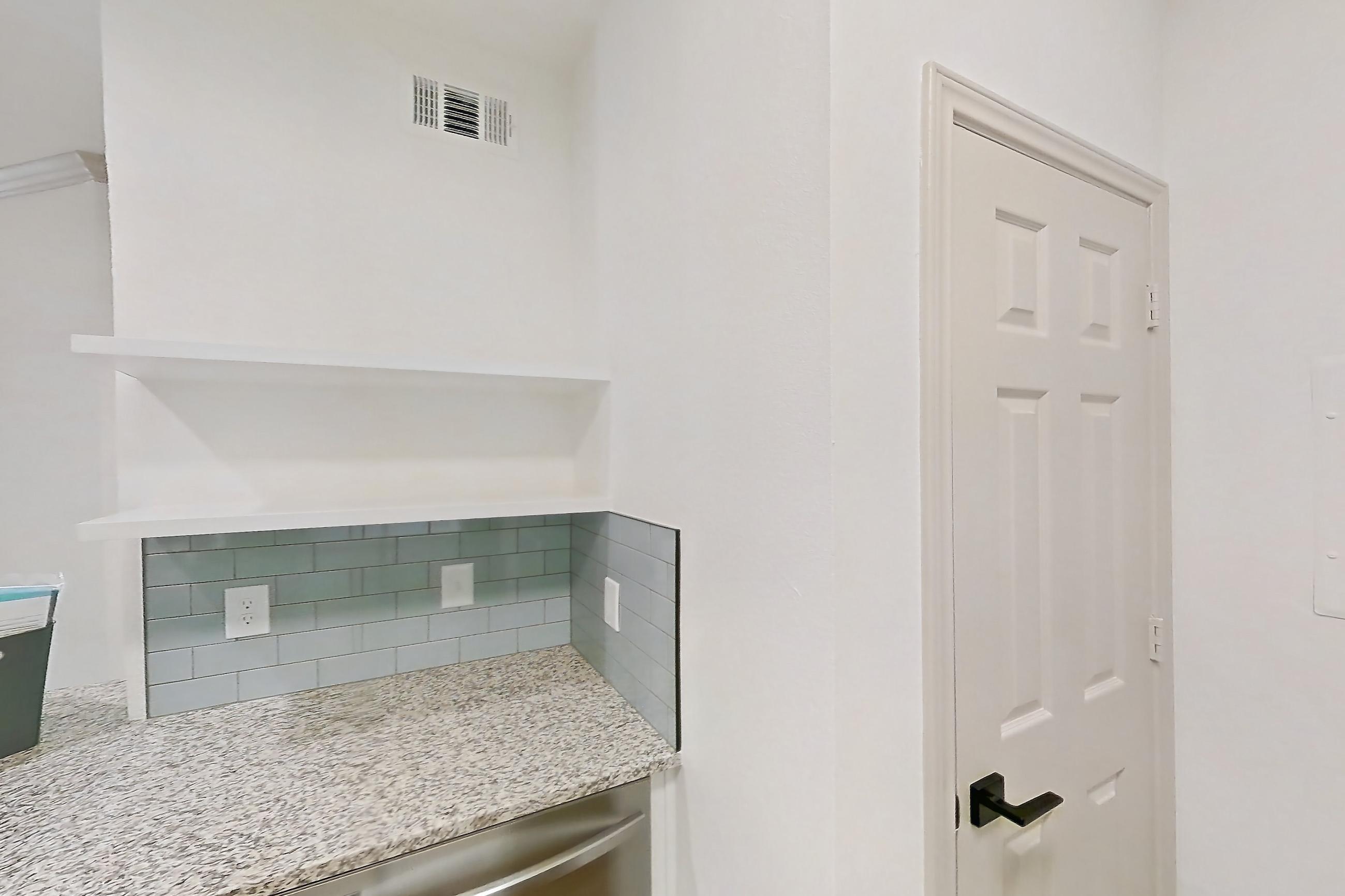 Kitchen in a B3R - Windermere floor plan apartment, representative of Apartment 16103 at Cortland Wortham