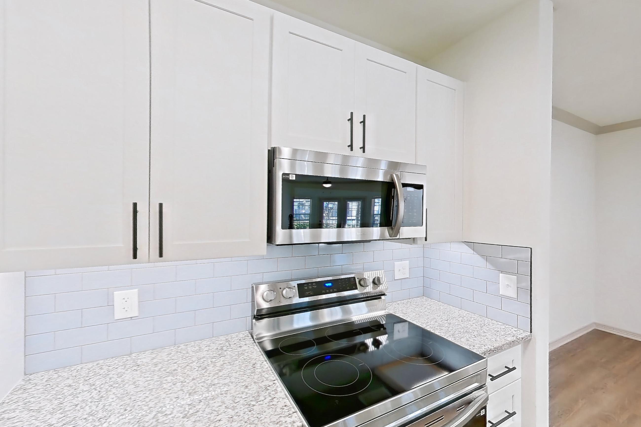 Kitchen in a B3R - Windermere floor plan apartment, representative of Apartment 16103 at Cortland Wortham