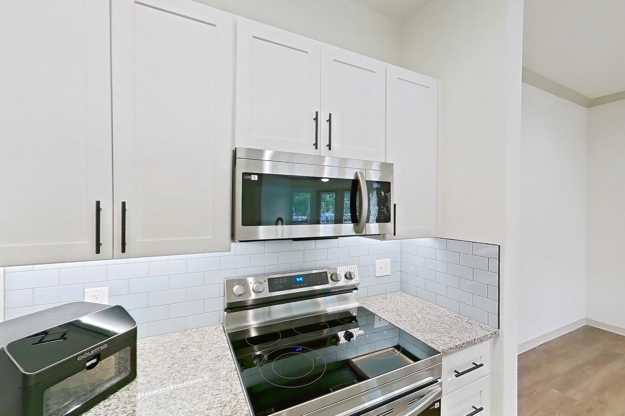 Kitchen in Apartment 16210 at Cortland Wortham, B3R - Windermere floor plan